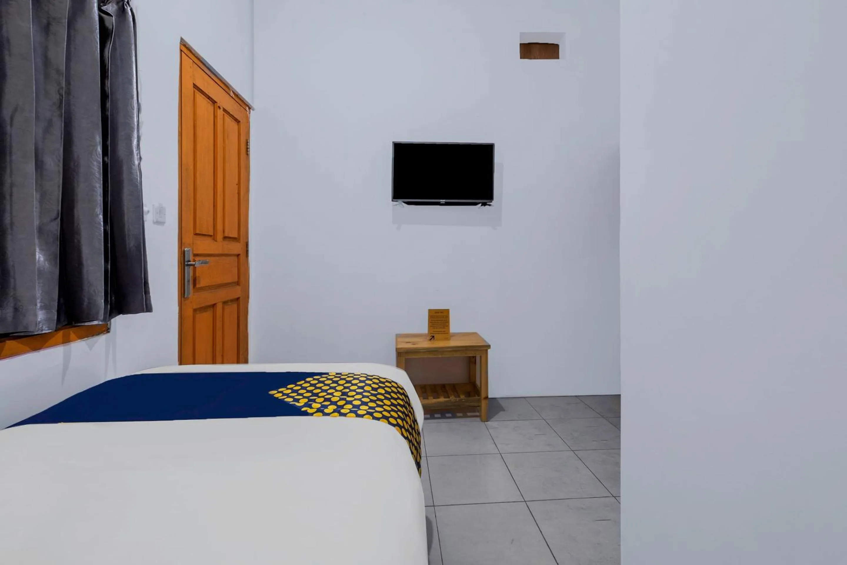 Bedroom, Bed in OYO Life 2412 Mandala Residence