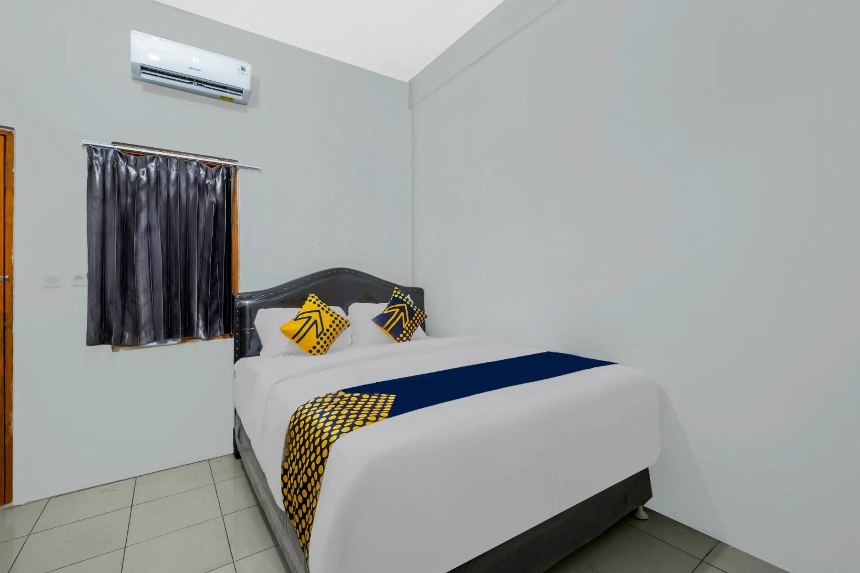 Bedroom, Bed in OYO Life 2412 Mandala Residence