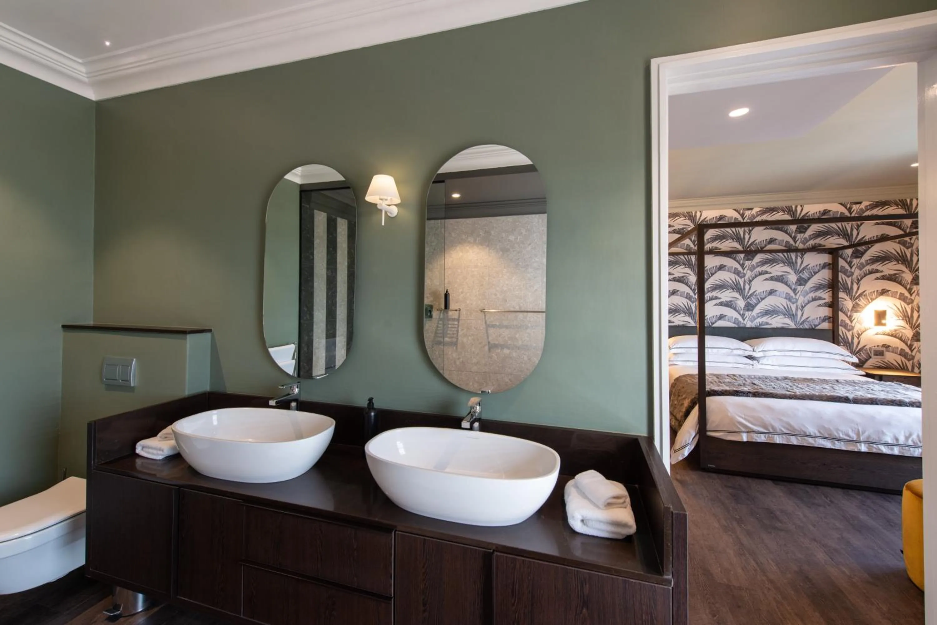 Bed in The Feather Hill Boutique Hotel