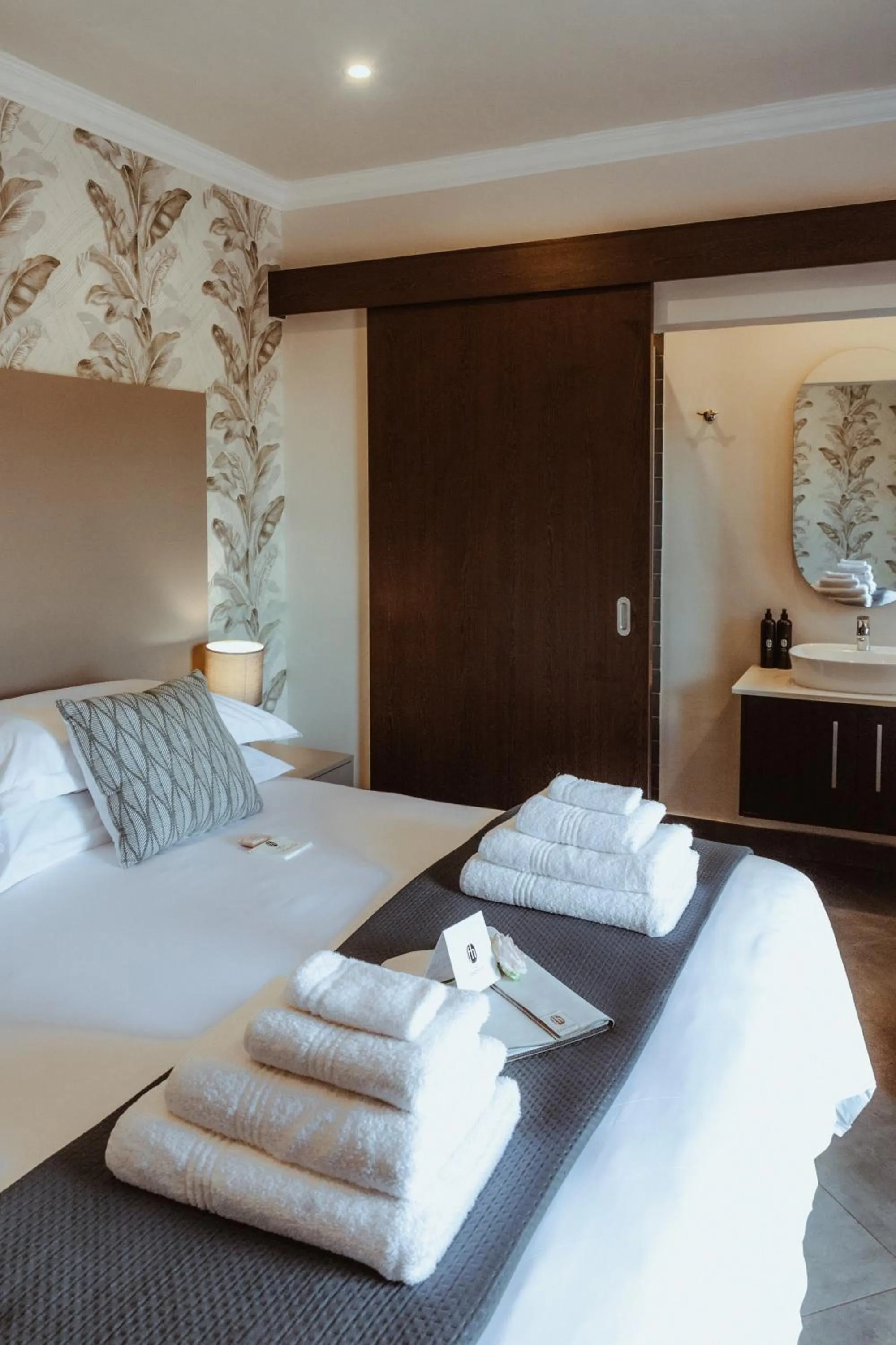 Bed in The Feather Hill Boutique Hotel