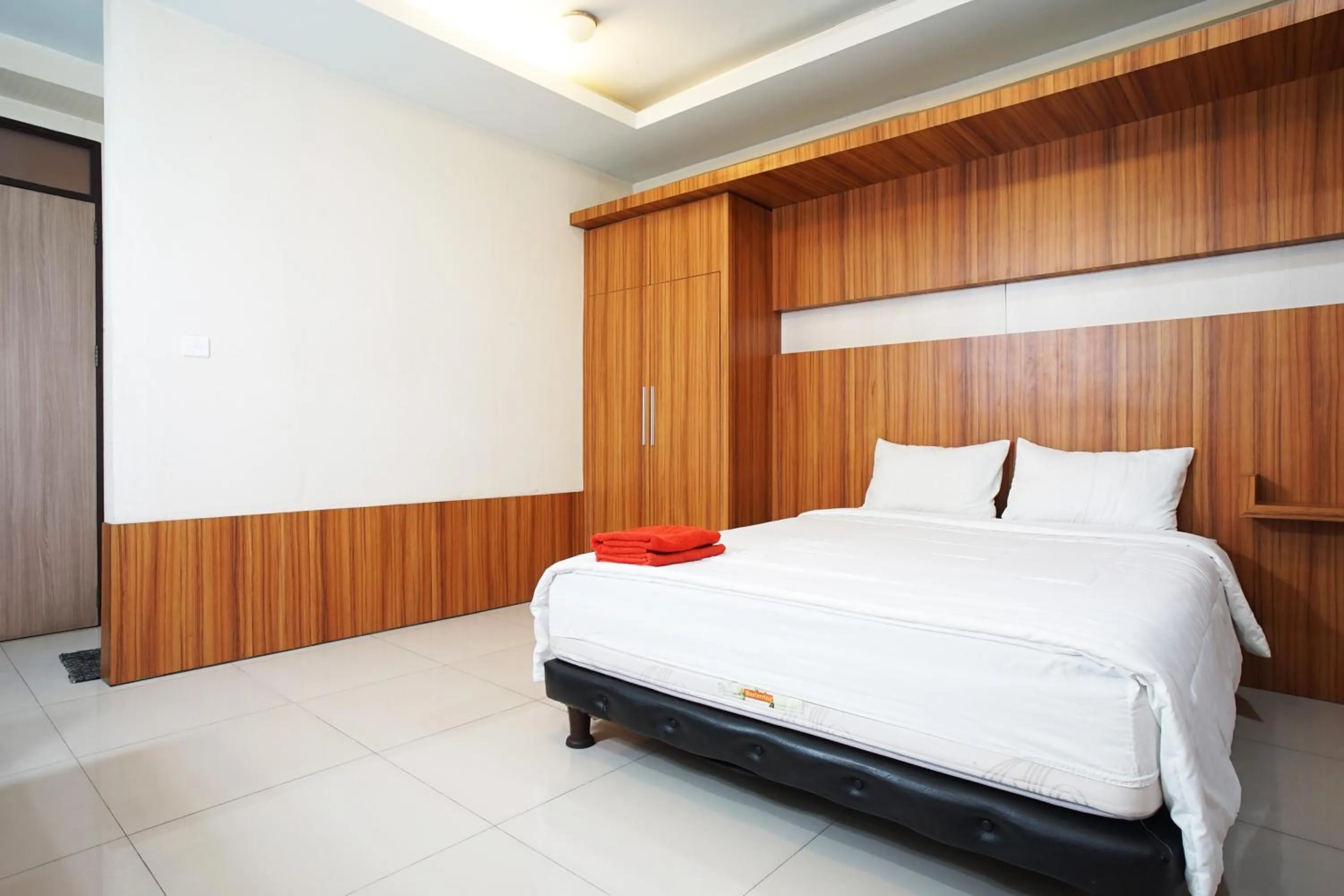 Bed in Kamarku Apartment at The Edge