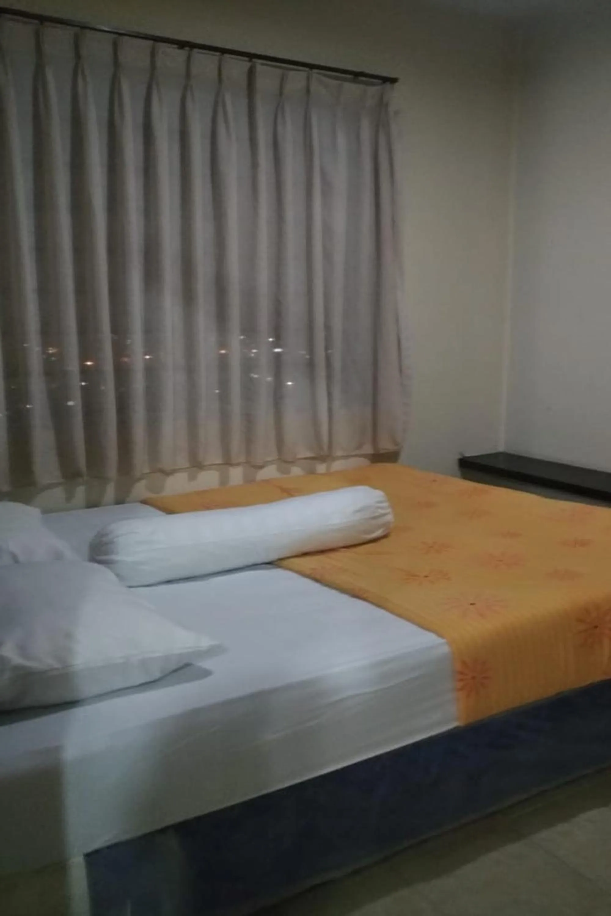 Bed in Kamarku Apartment at The Edge