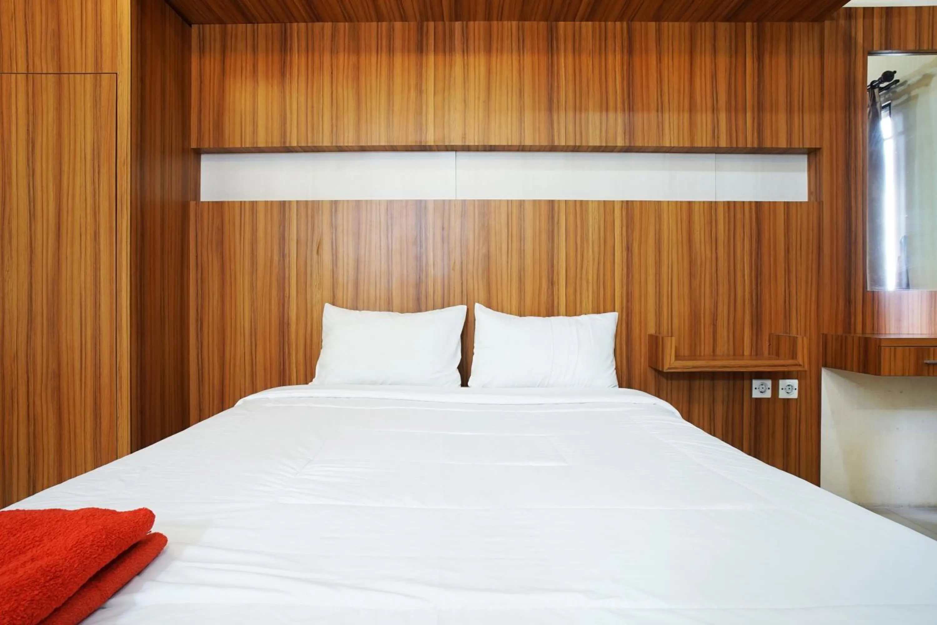 Bed in Kamarku Apartment at The Edge