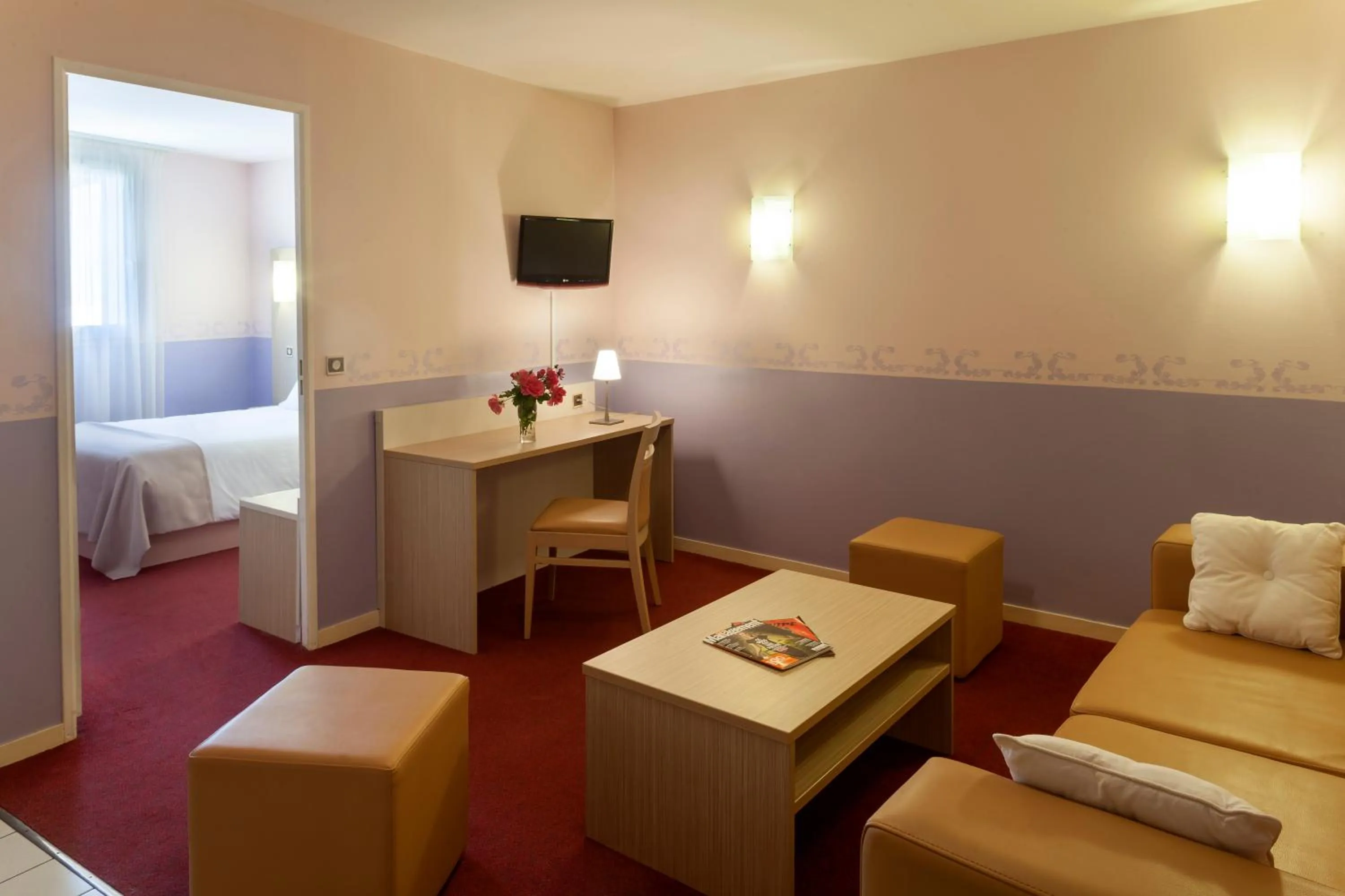 Bed in BRIT HOTEL Le Lion d'Or CHINON