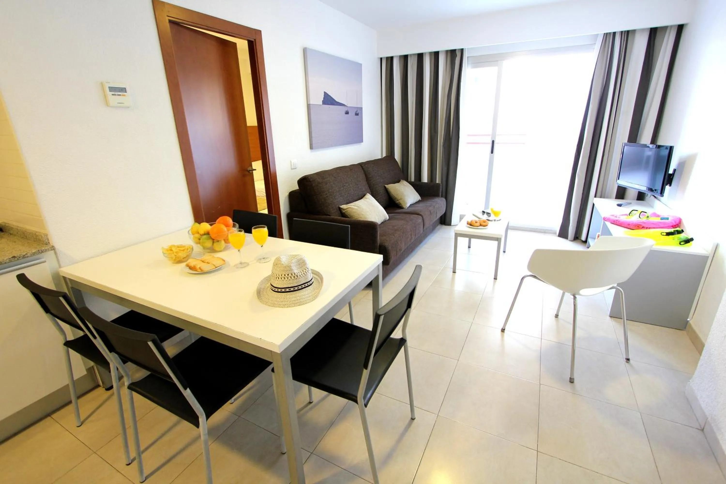 Living room in Pierre & Vacances Benidorm Levante - Adults Recommended