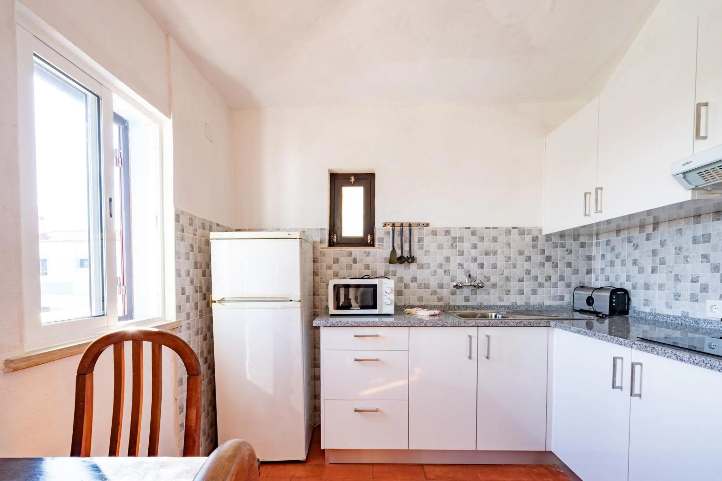 Kitchen or kitchenette in Quinta das Varandas by Umbral