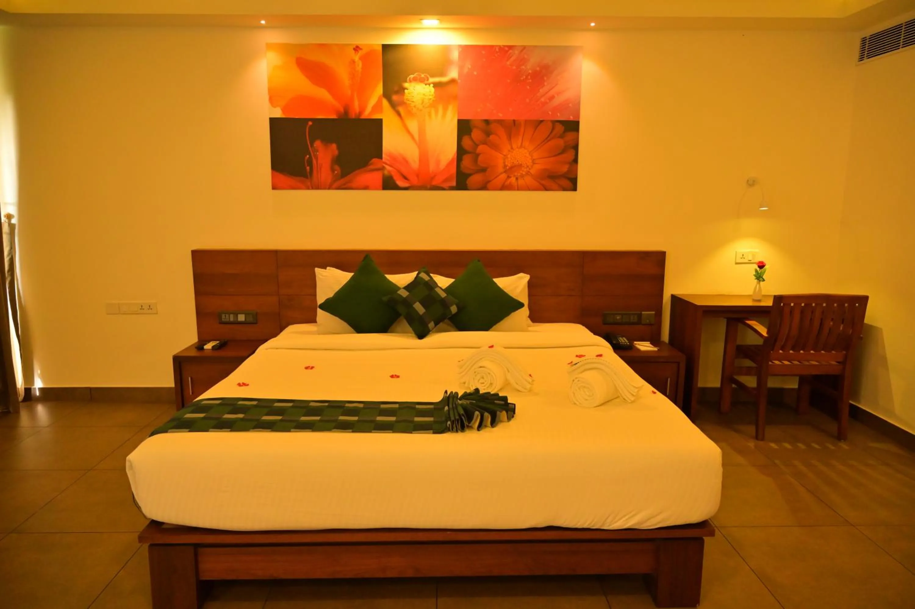 Bed in Aadisaktthi Leisure Resort, Kovalam