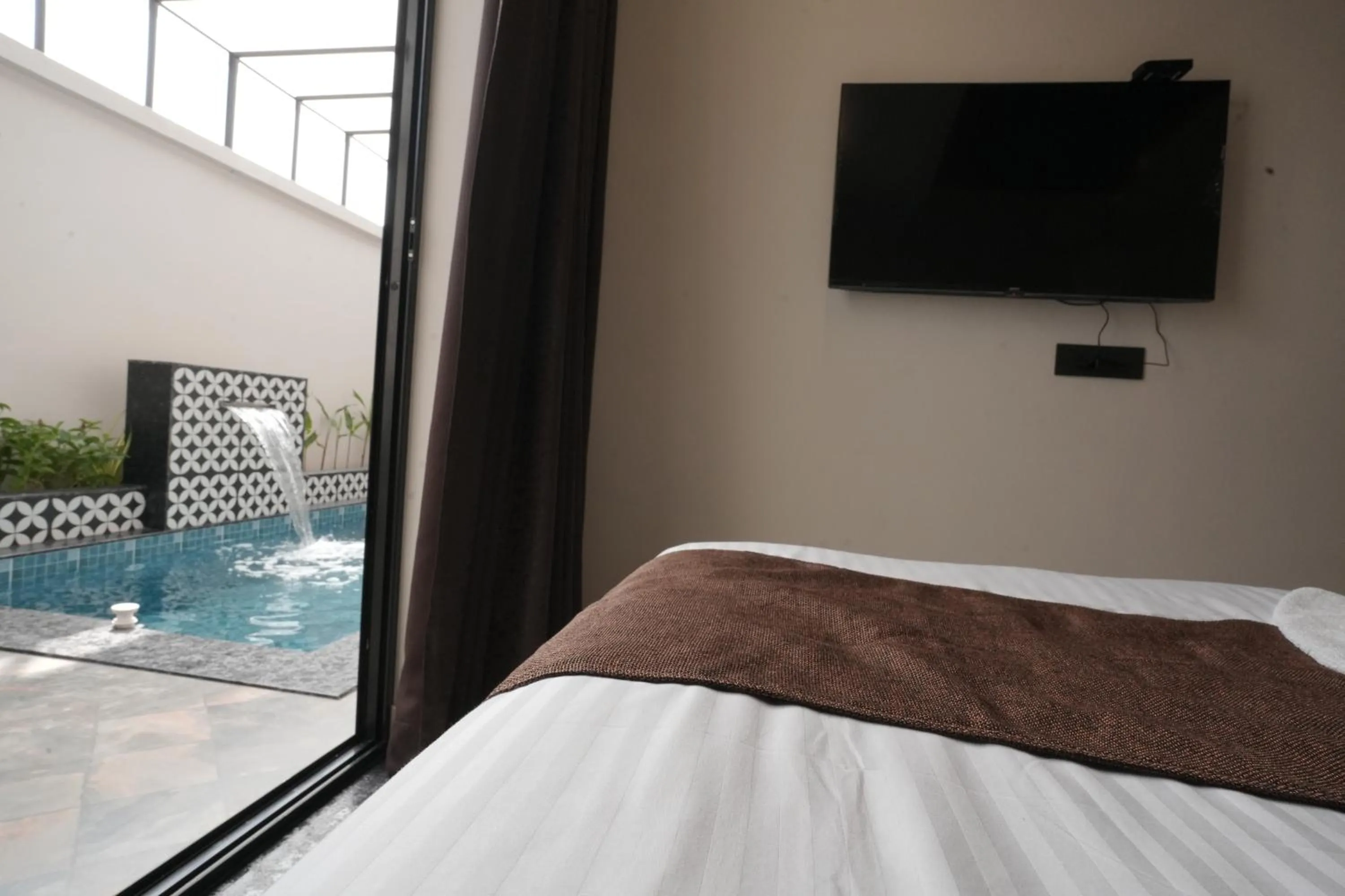 Bed in Aadisaktthi Leisure Resort, Kovalam