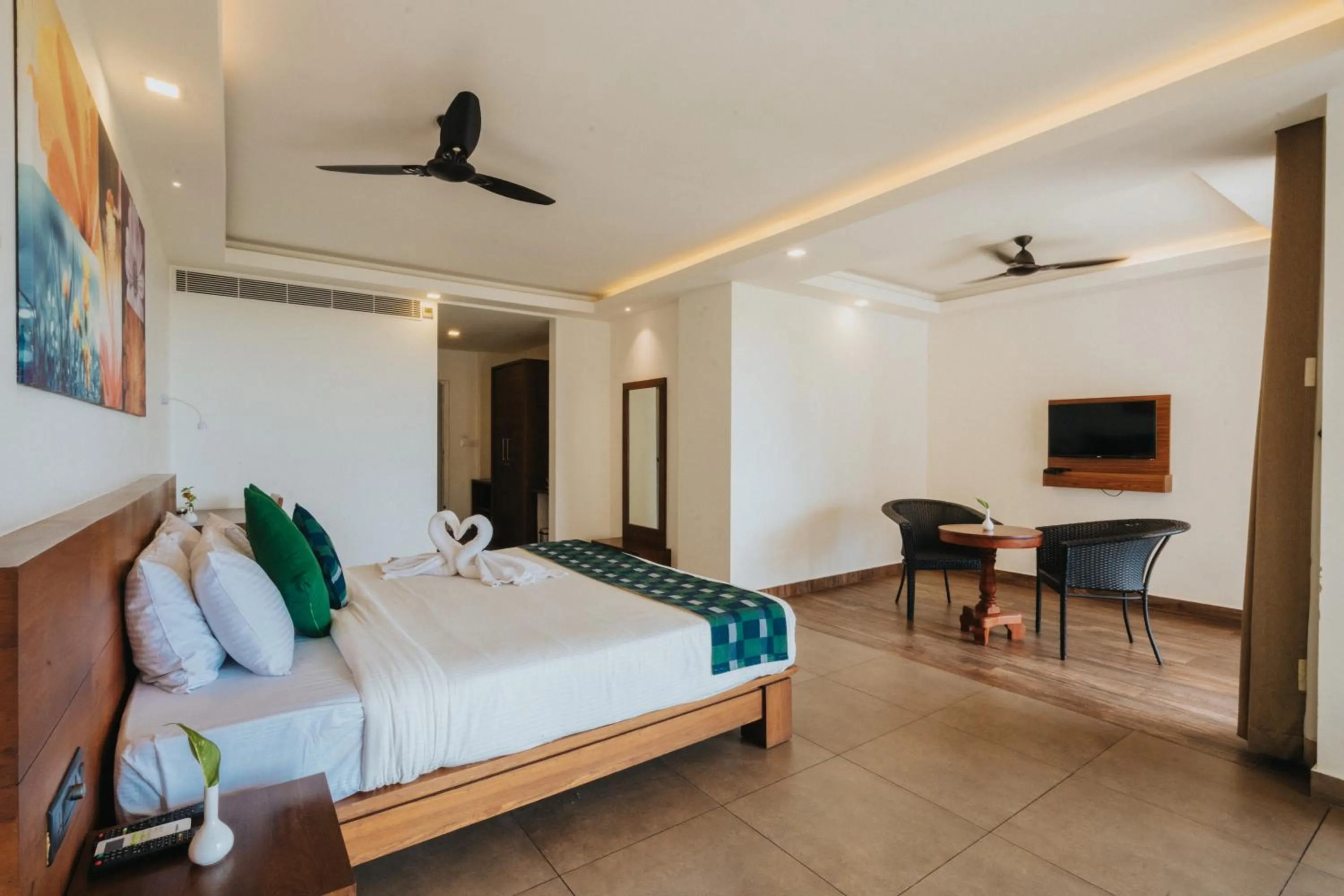 Bed in Aadisaktthi Leisure Resort, Kovalam