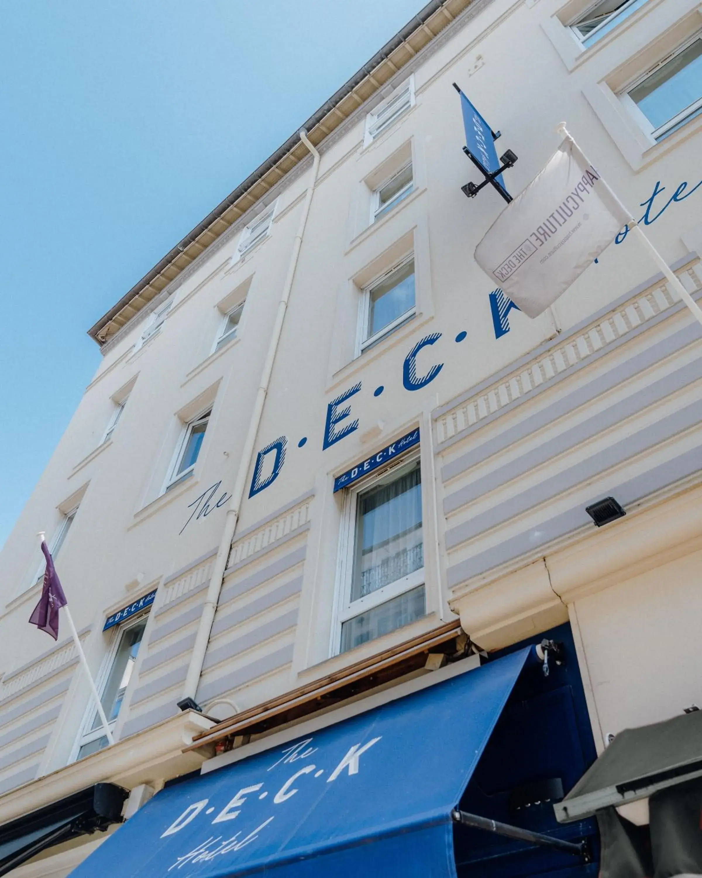 Property building in The Deck Hotel by Happyculture Property building in The Deck Hotel by Happyculture