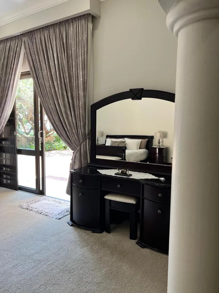 hair dresser, Bed in Letsatsing Lodge