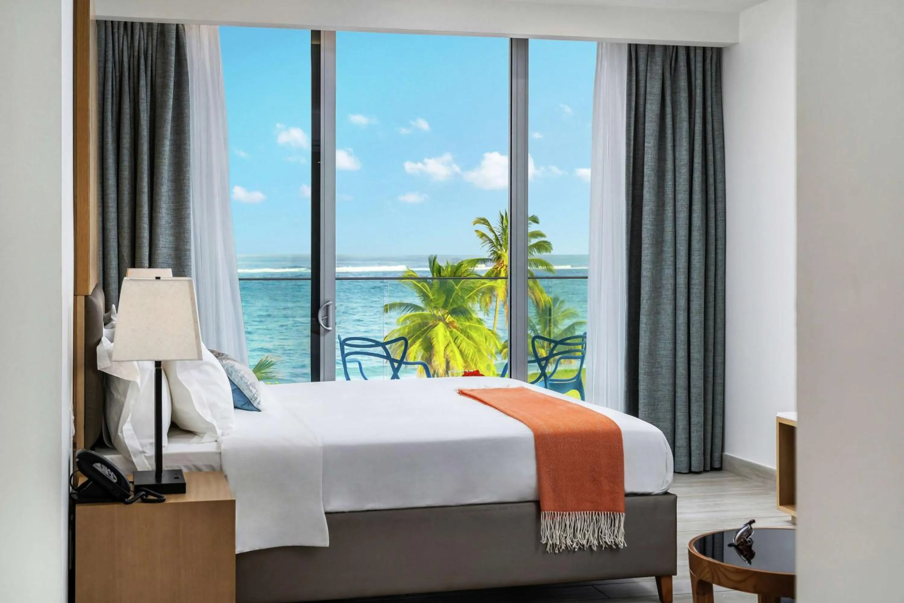 Bed in Koi Resort Saint Kitts, Curio Collection by Hilton