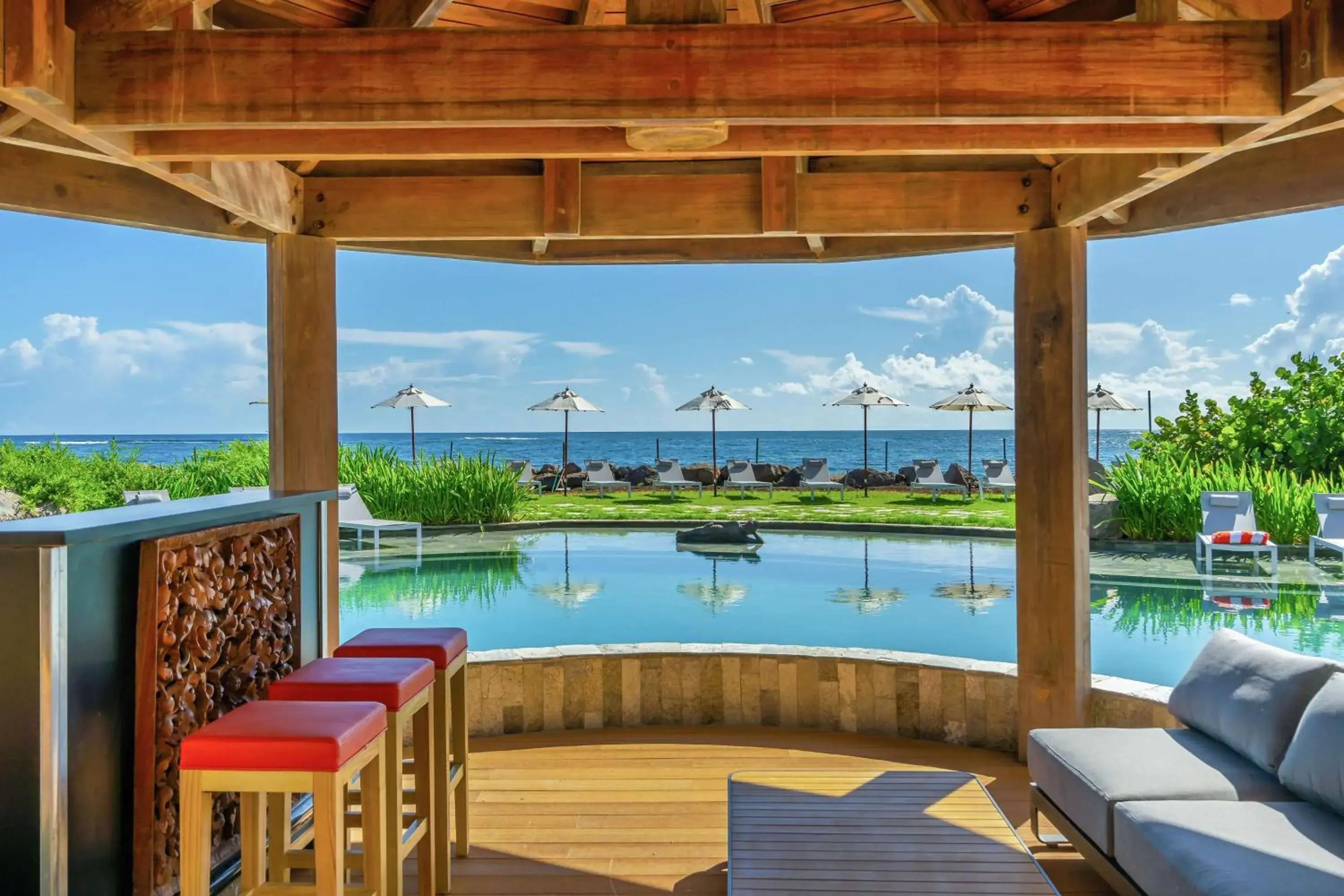 Pool view in Koi Resort Saint Kitts, Curio Collection by Hilton Pool view in Koi Resort Saint Kitts, Curio Collection by Hilton