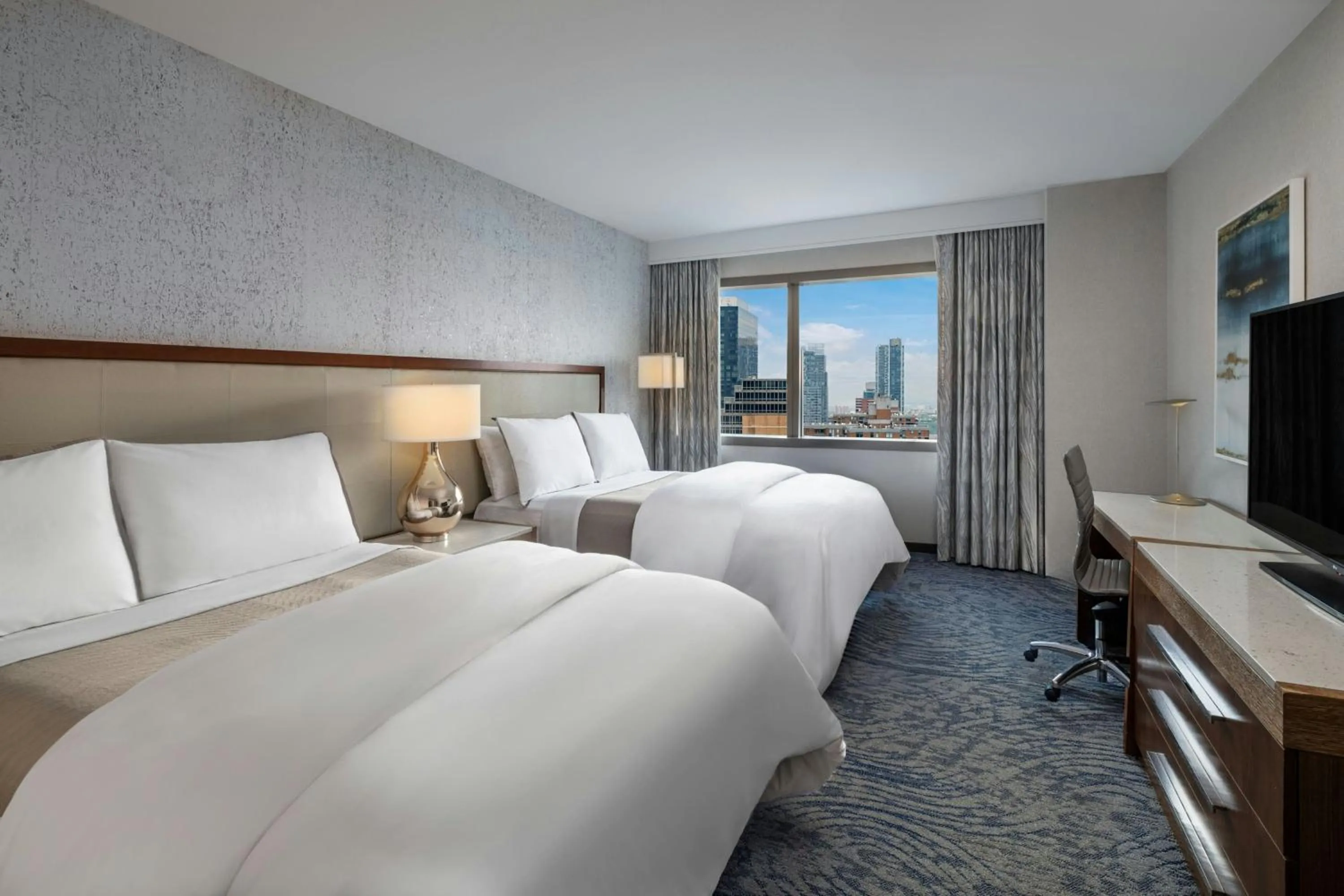 Photo of the whole room, Bed in The Westin New York at Times Square