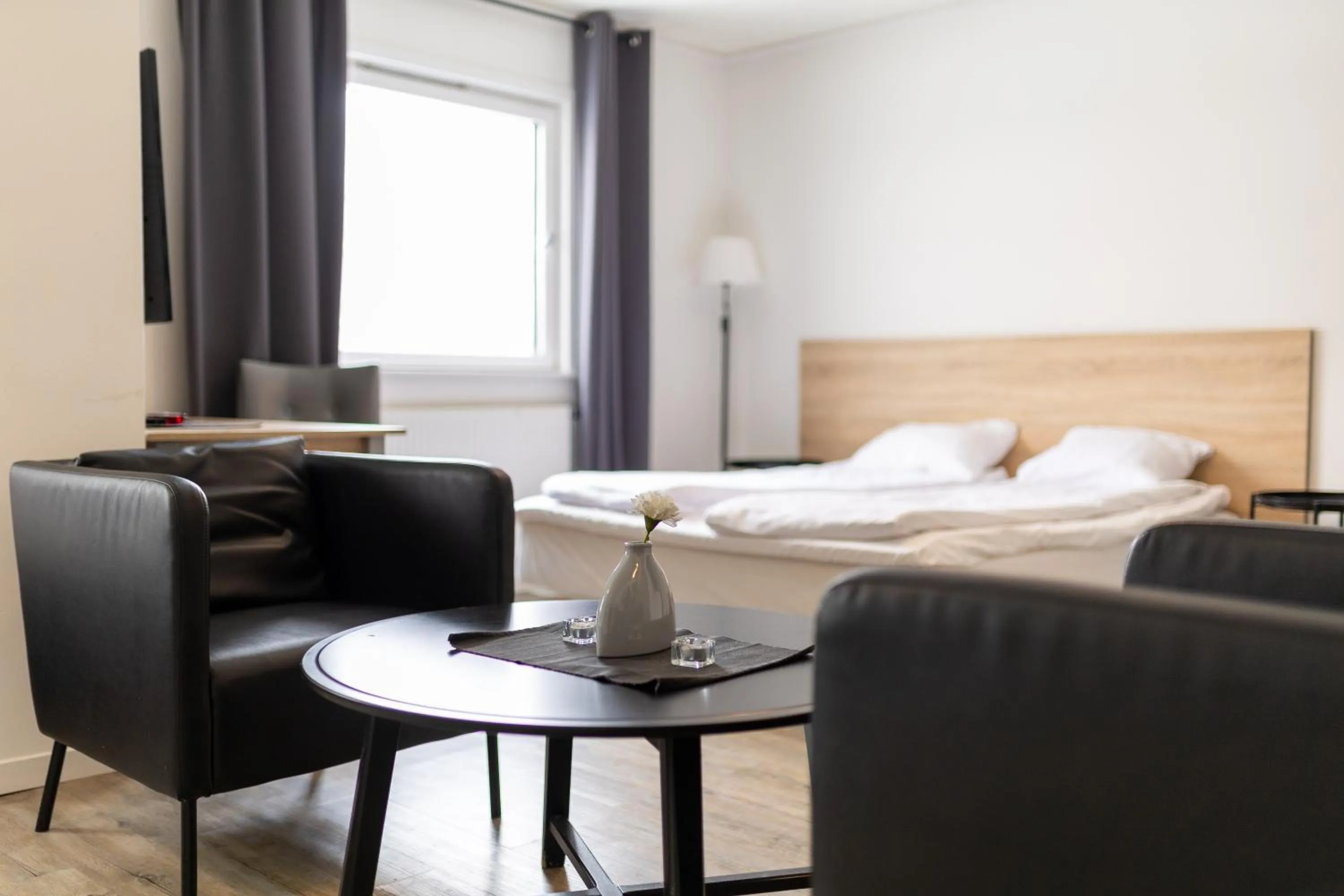 Seating area, Bed in Halmstad Hotel Apartments