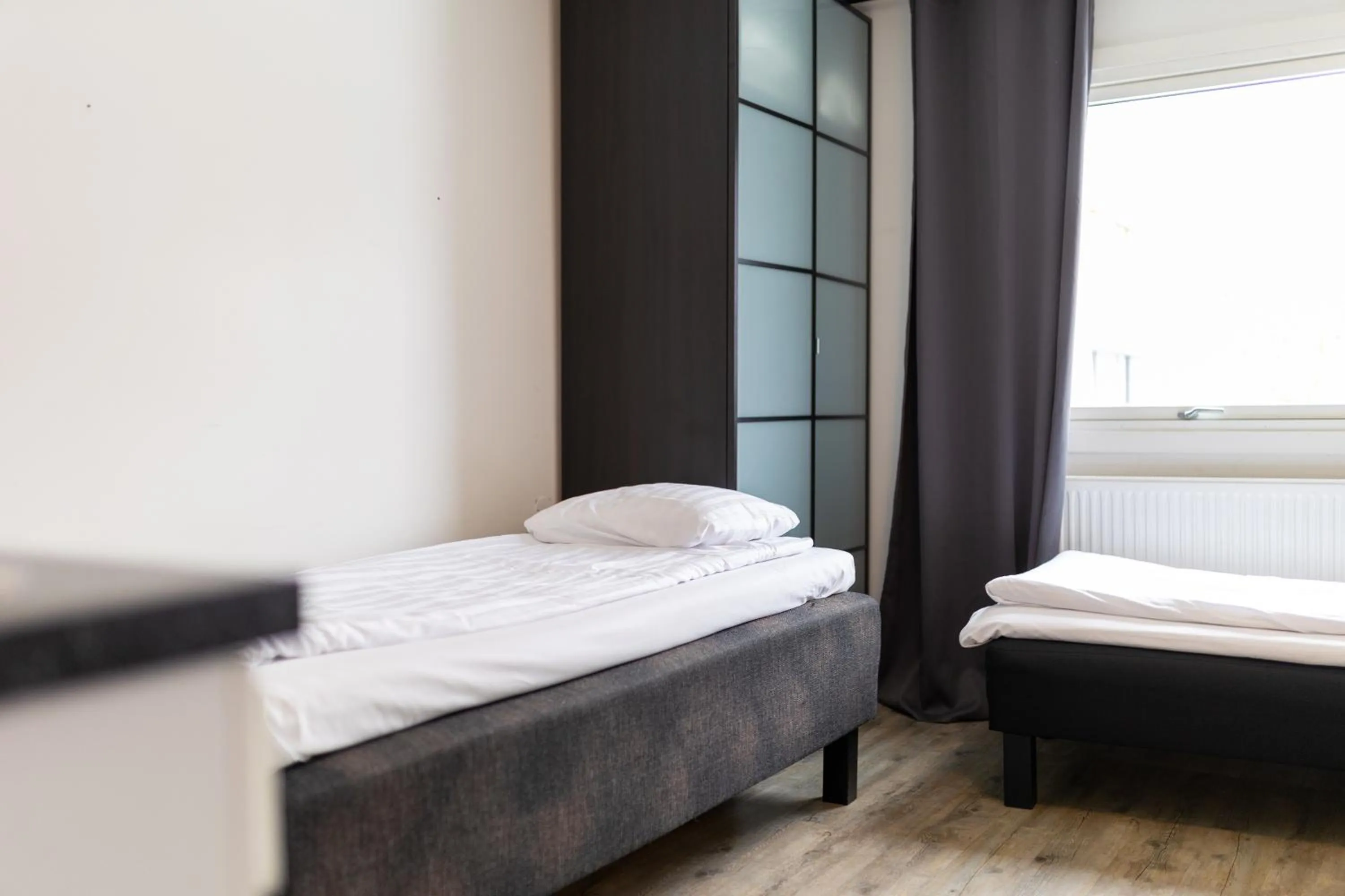 Bed in Halmstad Hotel Apartments