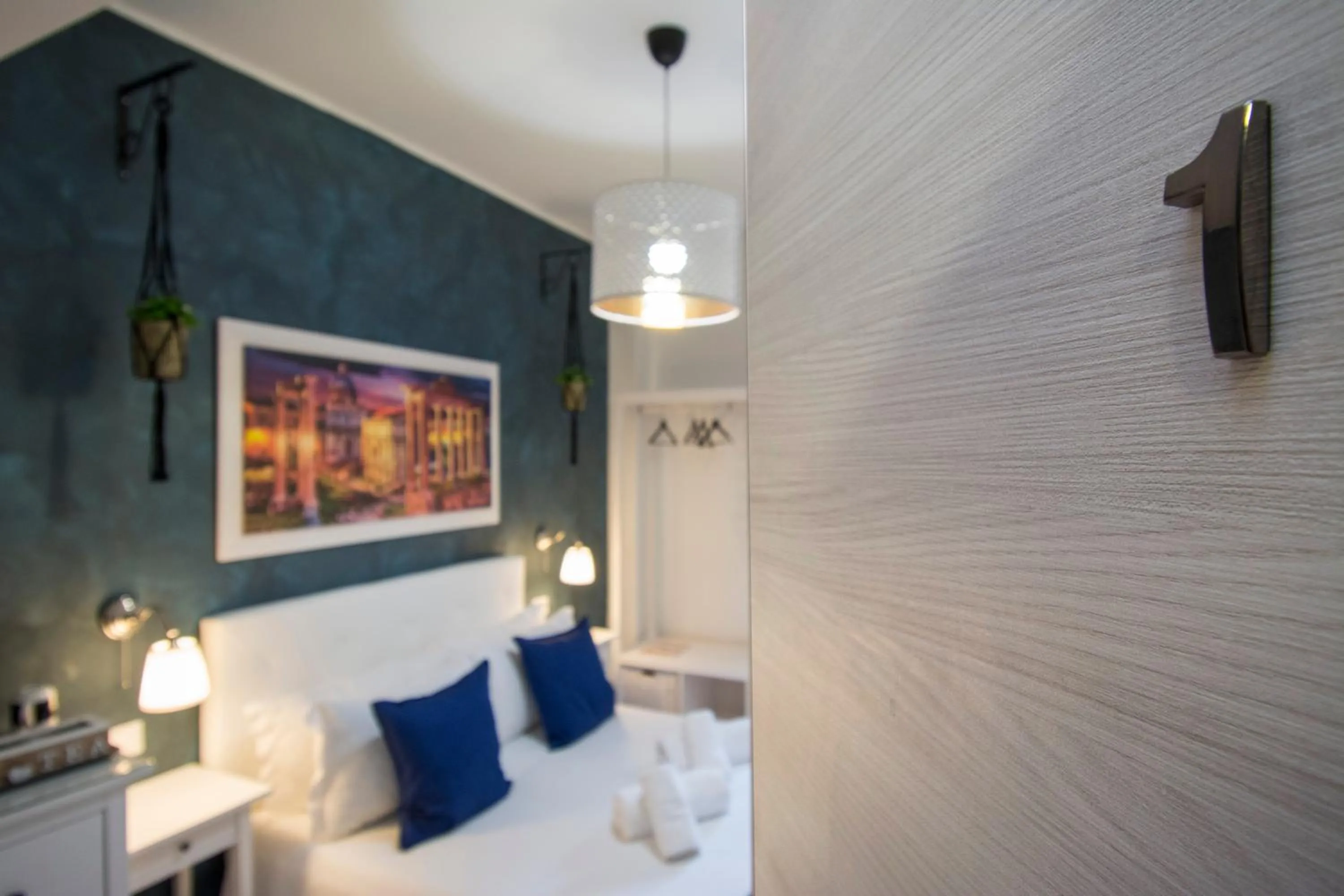 Bed in Piccolo Hotel Boutique