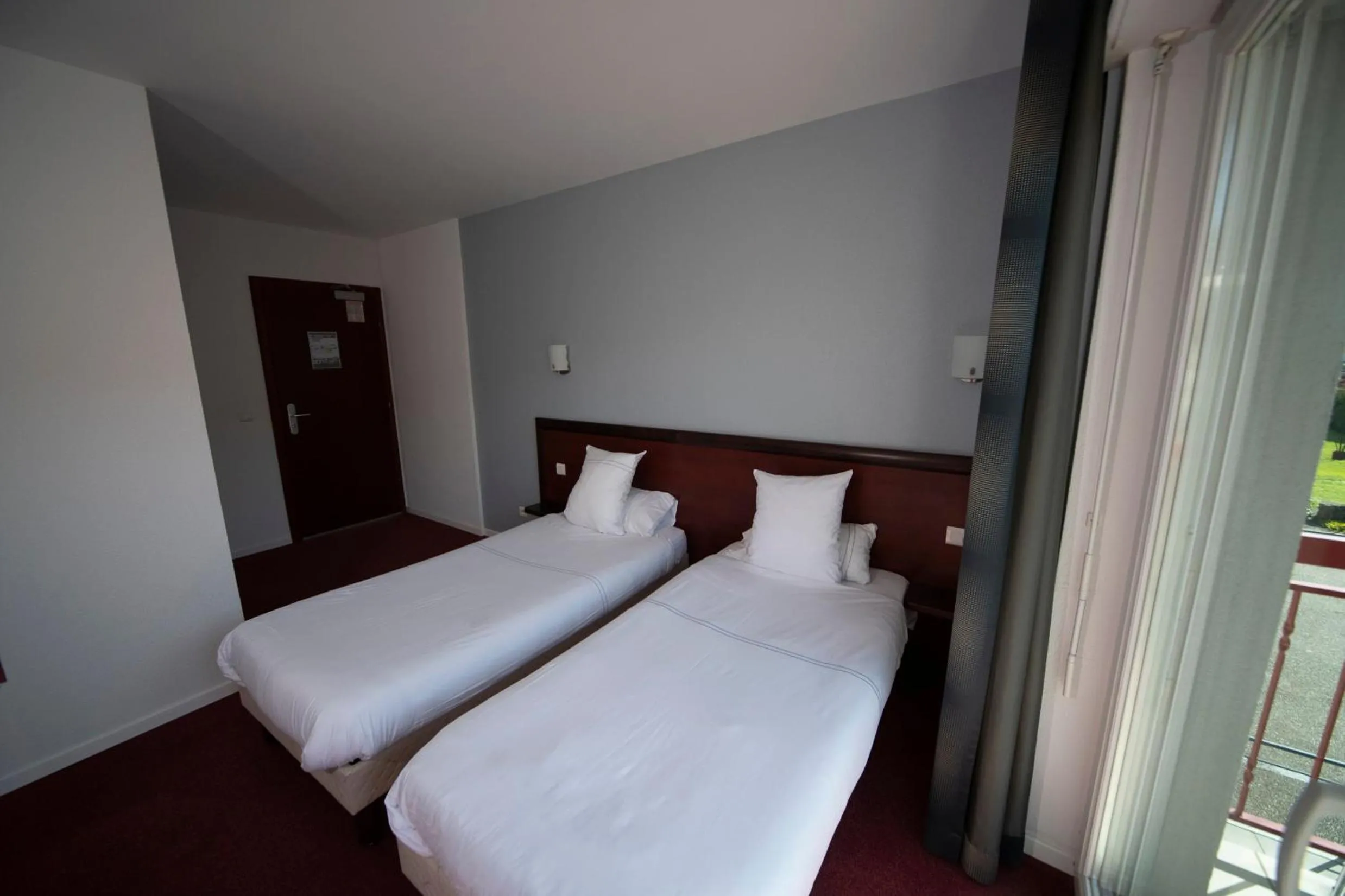 Twin Room - single occupancy in Logis Hôtel & Restaurant Au Lion d'Or