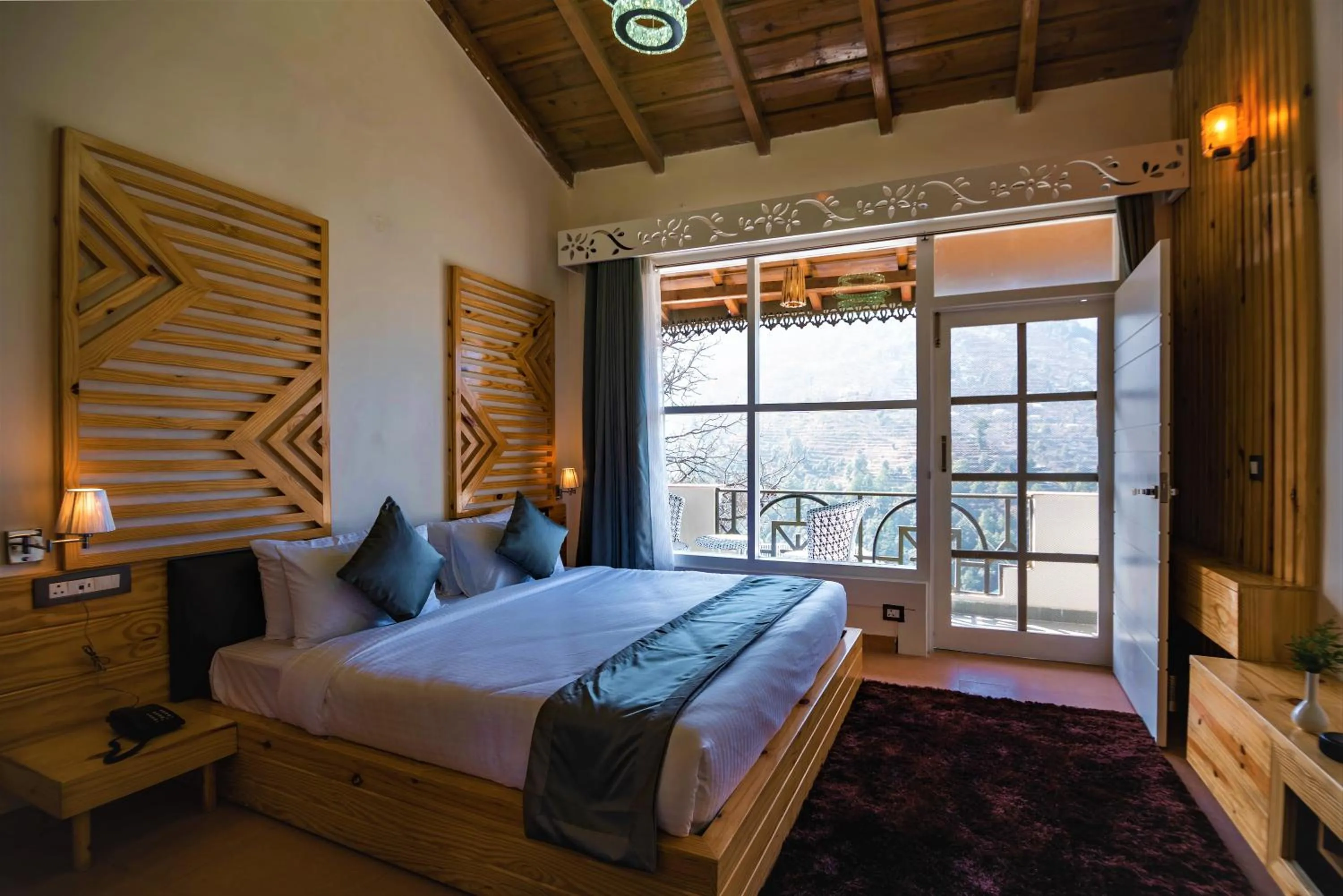 Bed in Clarks Exotica Resort Ramgarh Mukteshwar