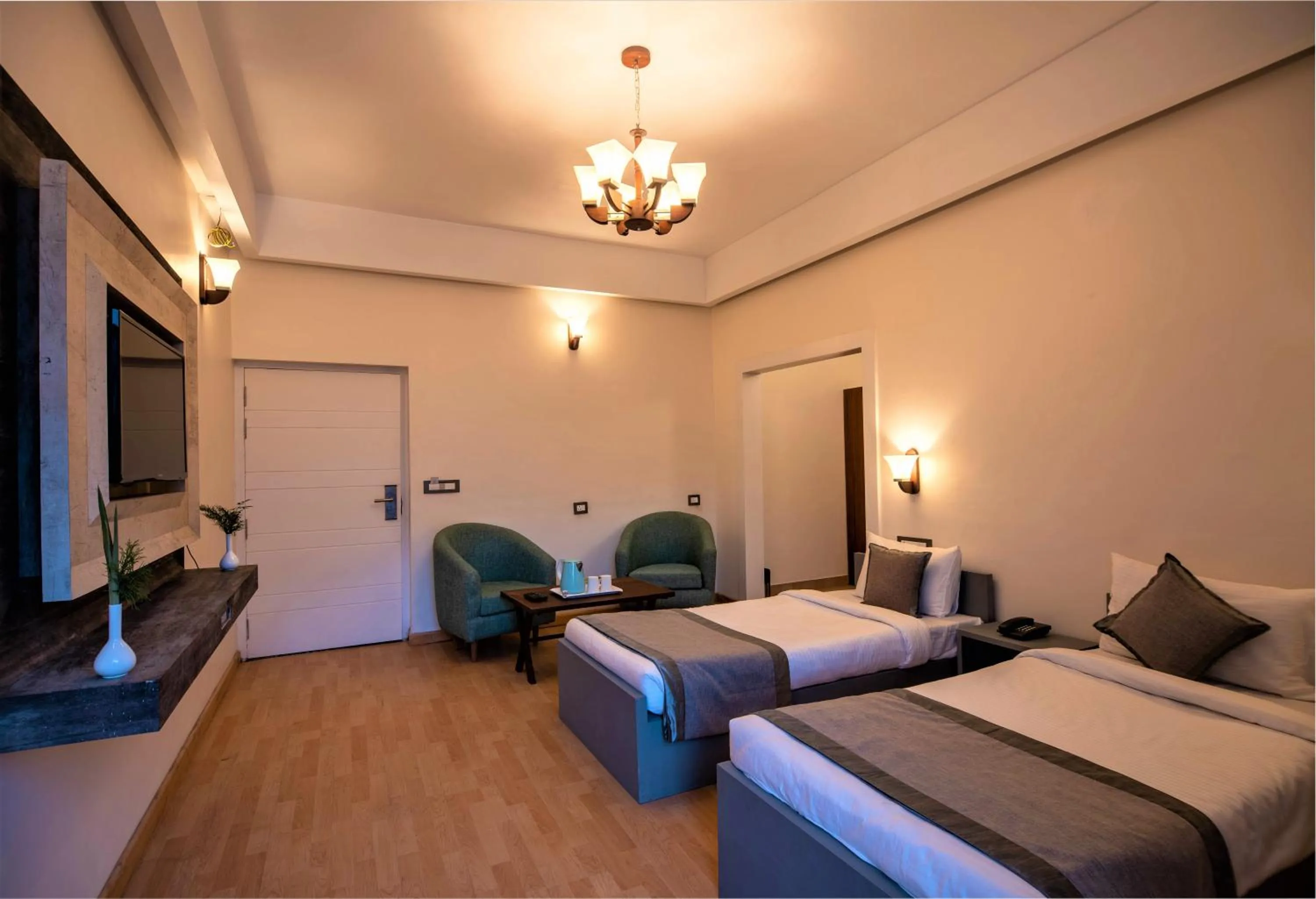 Bed in Clarks Exotica Resort Ramgarh Mukteshwar