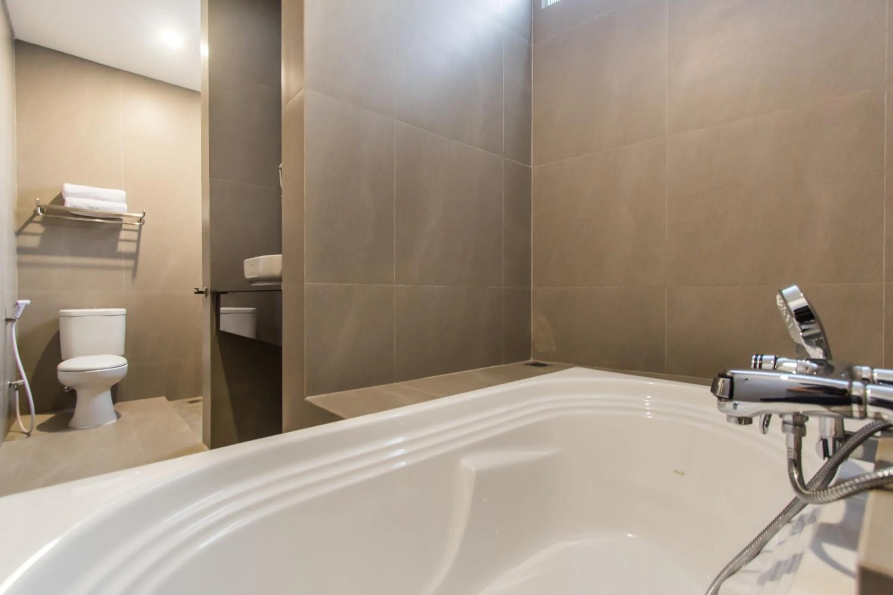 Bath in Kuta Legian Villa by Kamara