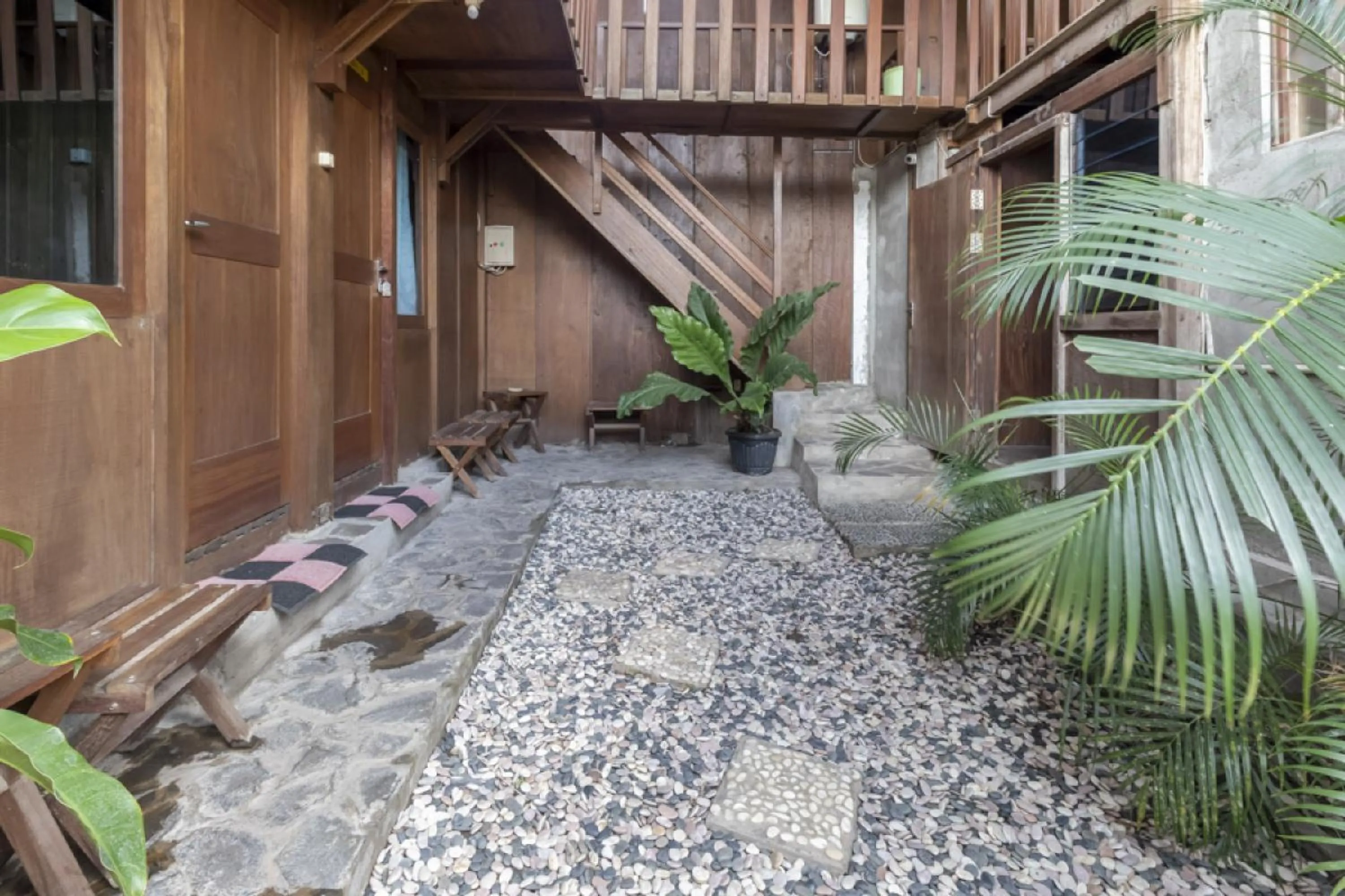 Facade/entrance in RedDoorz at Omah Kayu Homestay Yogyakarta