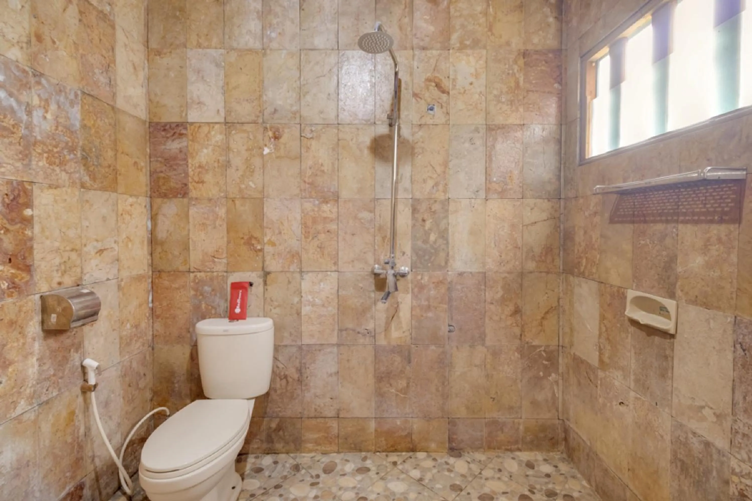 Bathroom in RedDoorz at Omah Kayu Homestay Yogyakarta