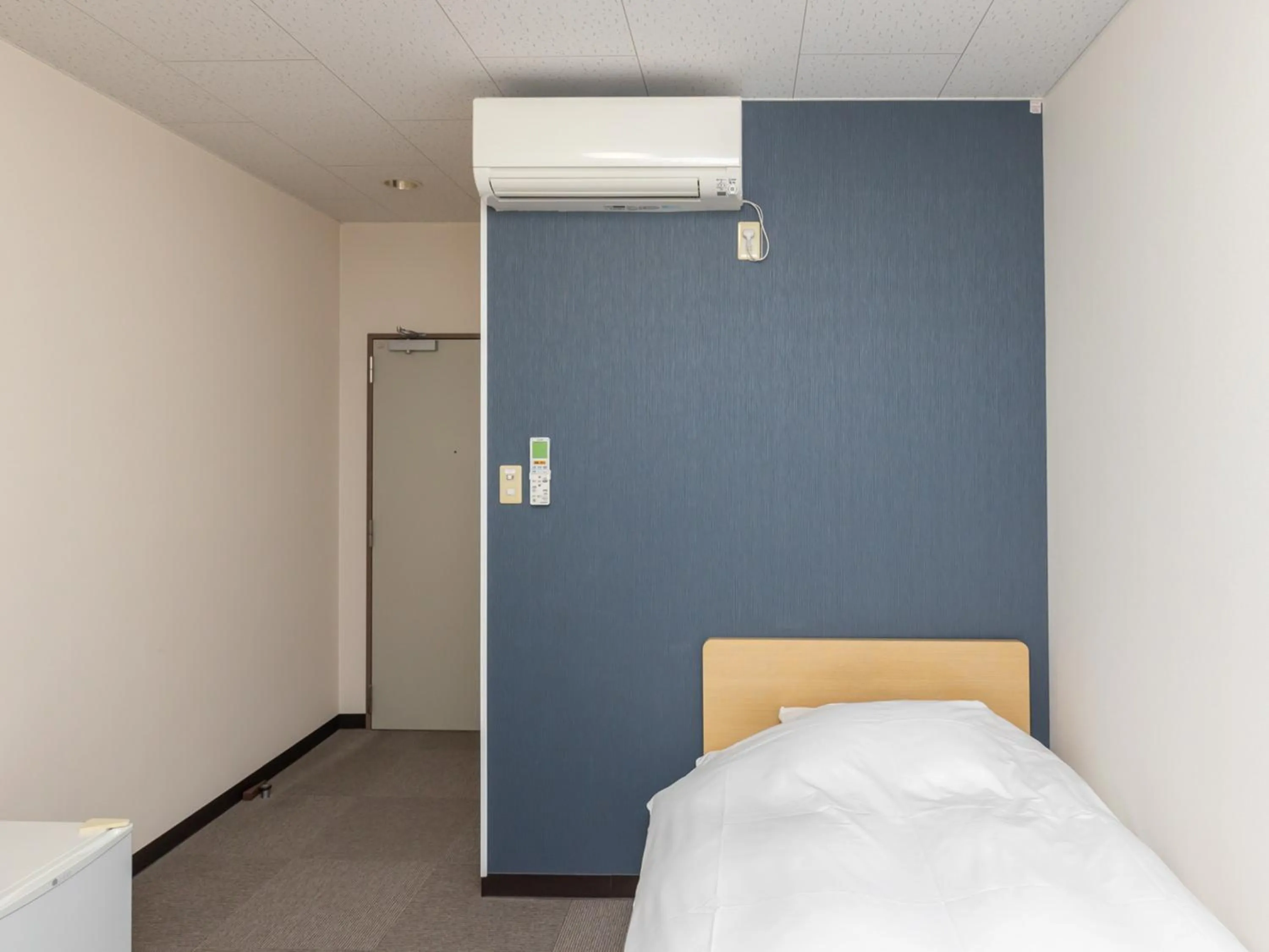 Bed in Tabist Hachi no Oyado Numadate Heights