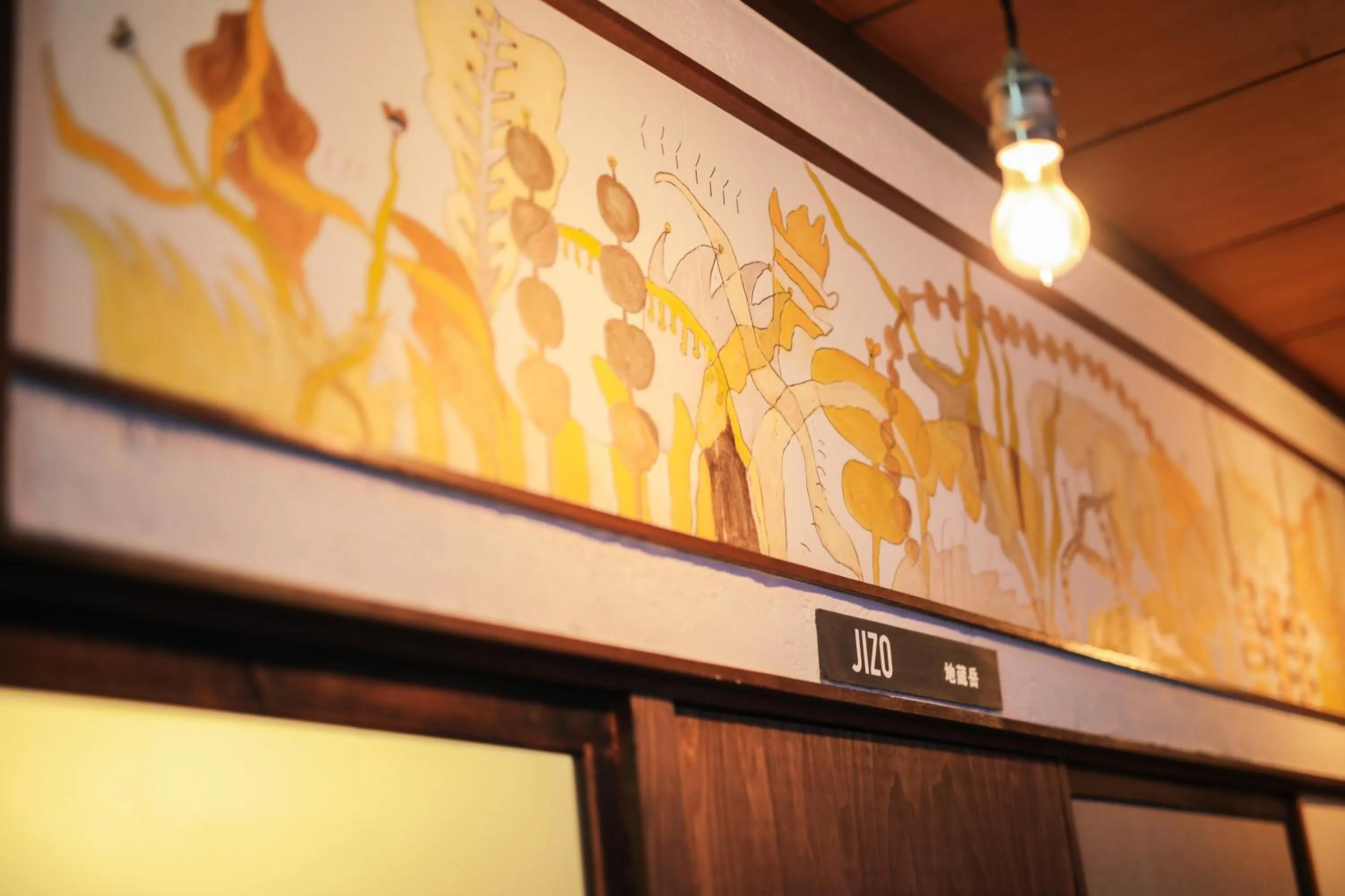 Decorative detail in chAho Hostel Nirasaki / Outdoor Base