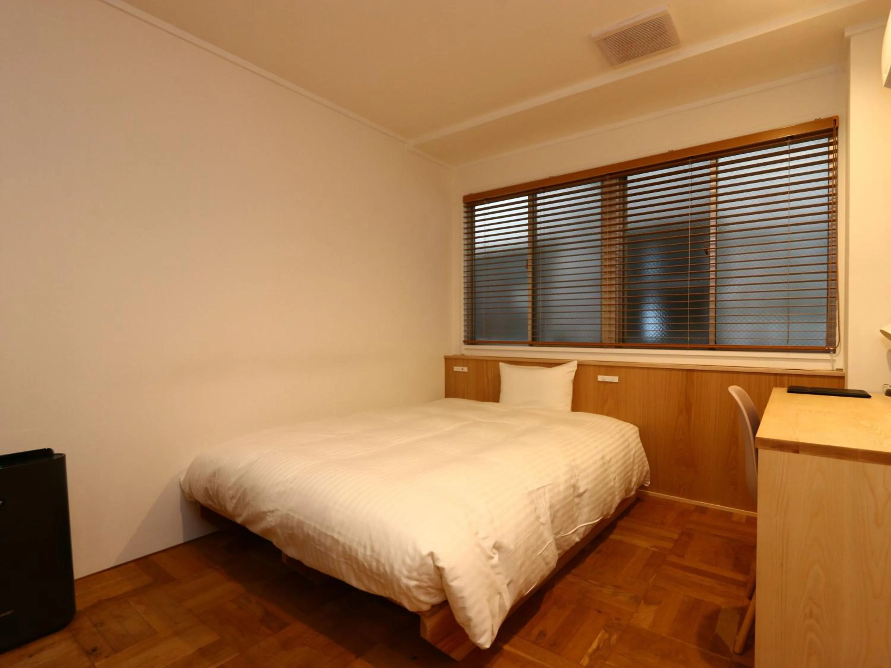 Bed in nirasakiyaSTAY