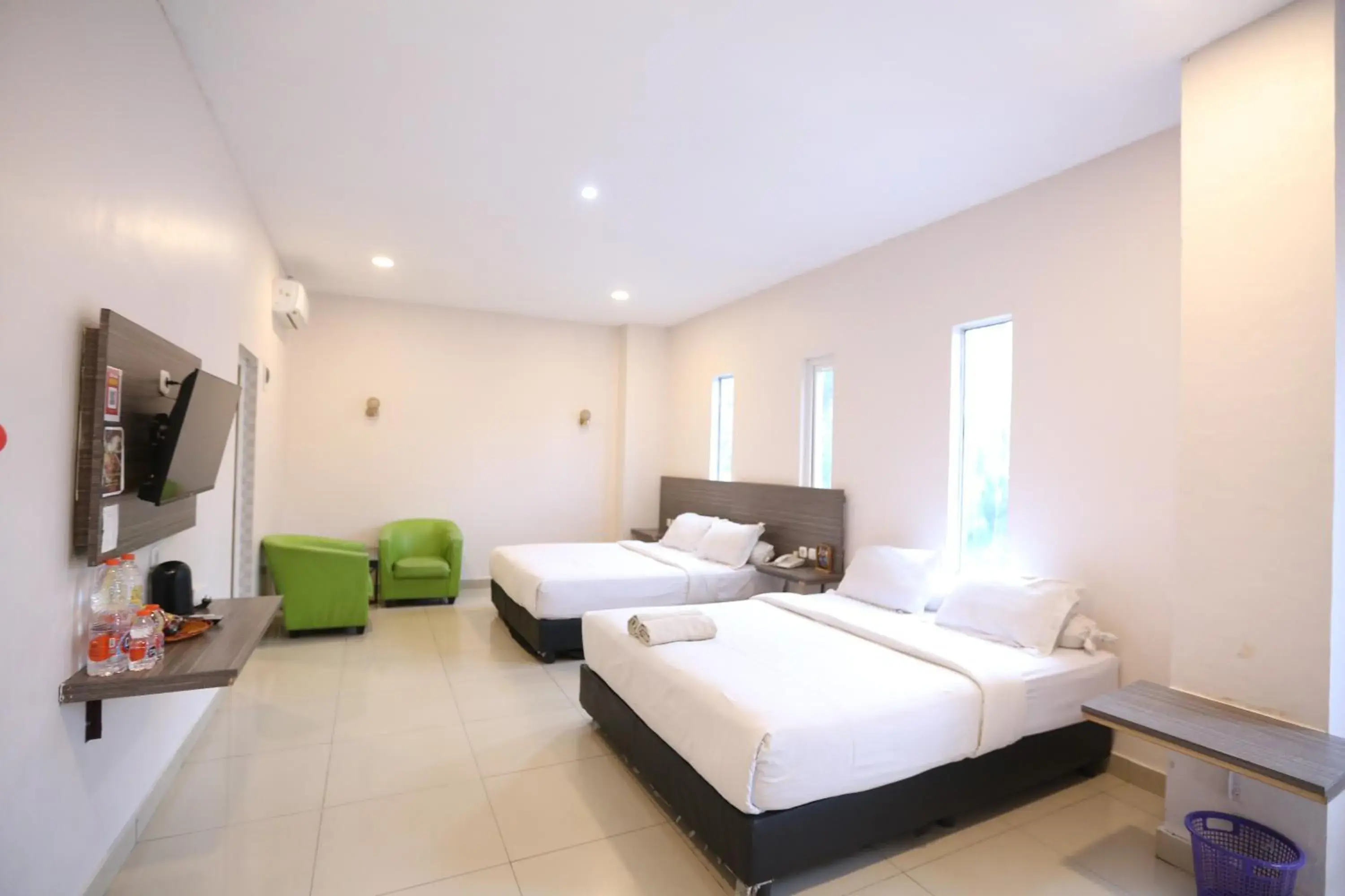 Bed in De'Tonga Hotel Bed in De'Tonga Hotel