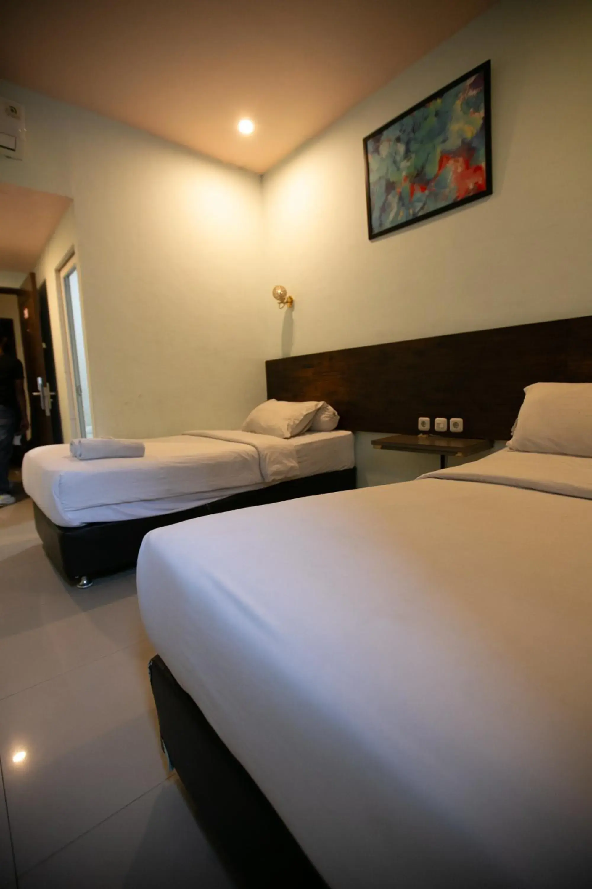 Bed in De'Tonga Hotel Bed in De'Tonga Hotel