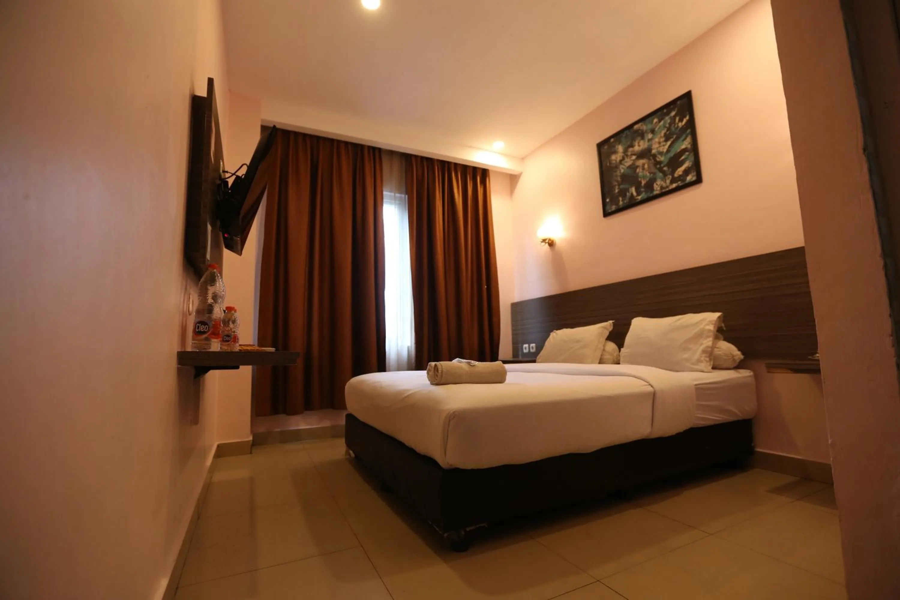 Bed in De'Tonga Hotel