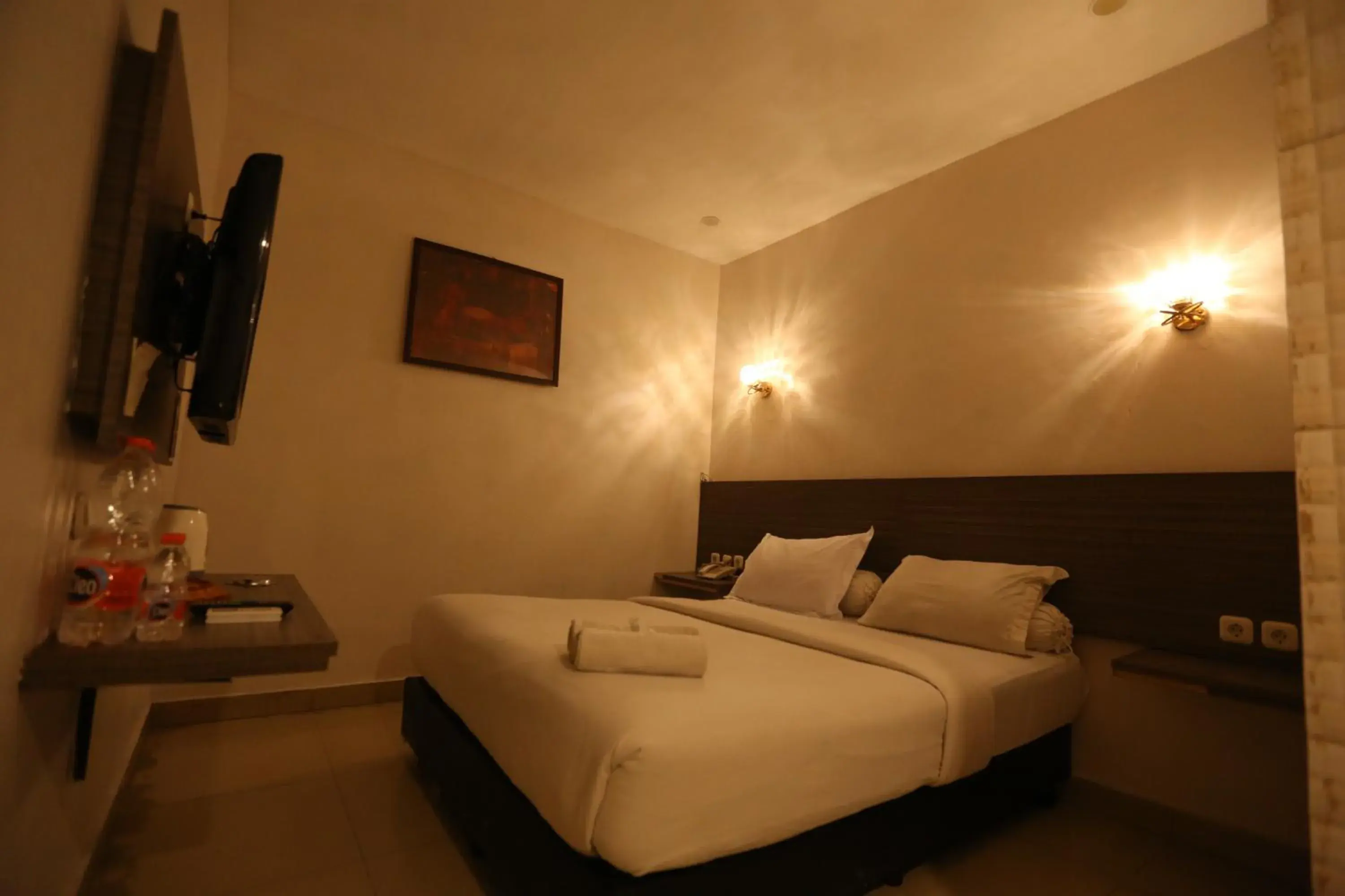 Bed in De'Tonga Hotel Bed in De'Tonga Hotel