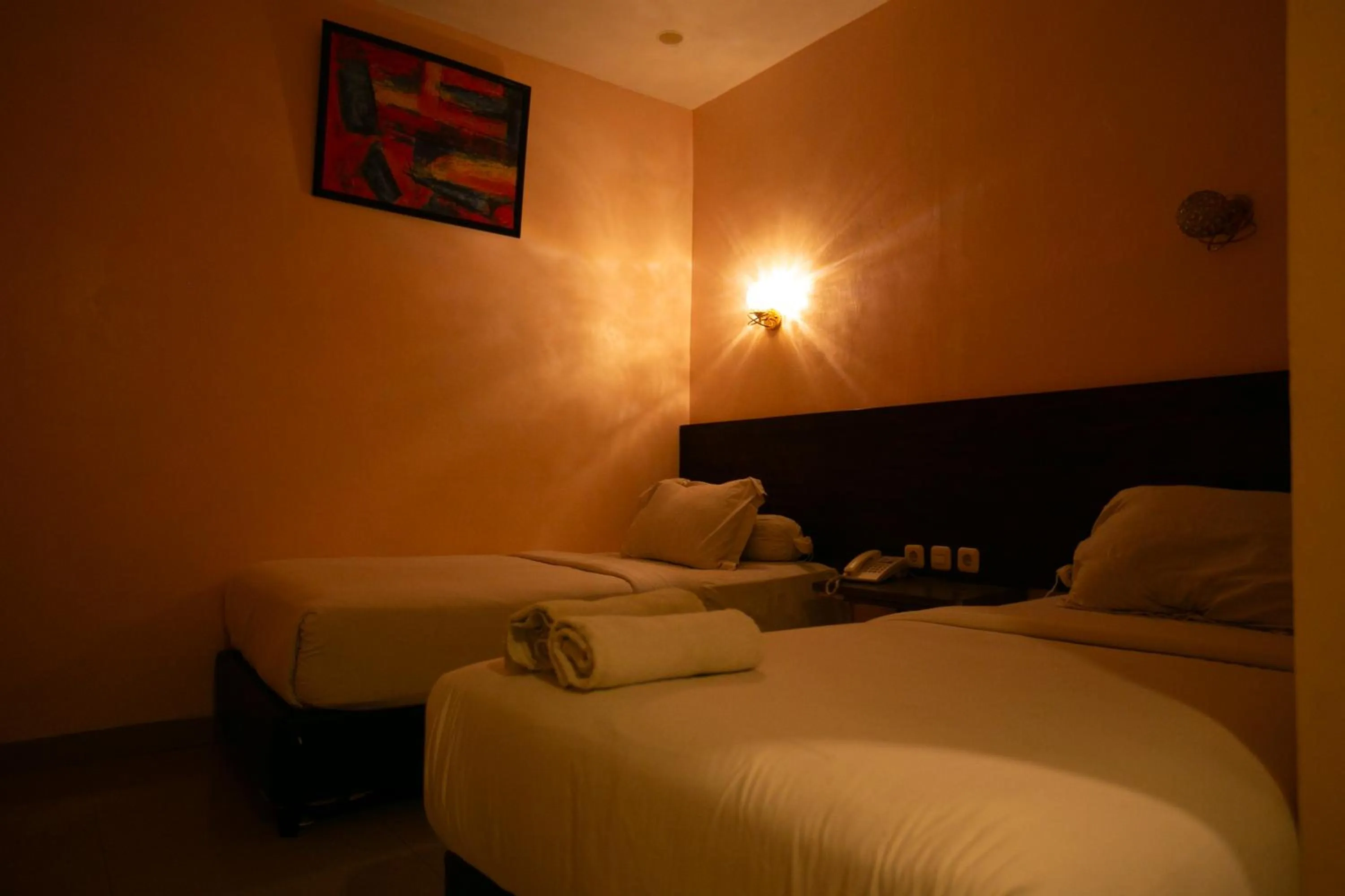 Bed in De'Tonga Hotel