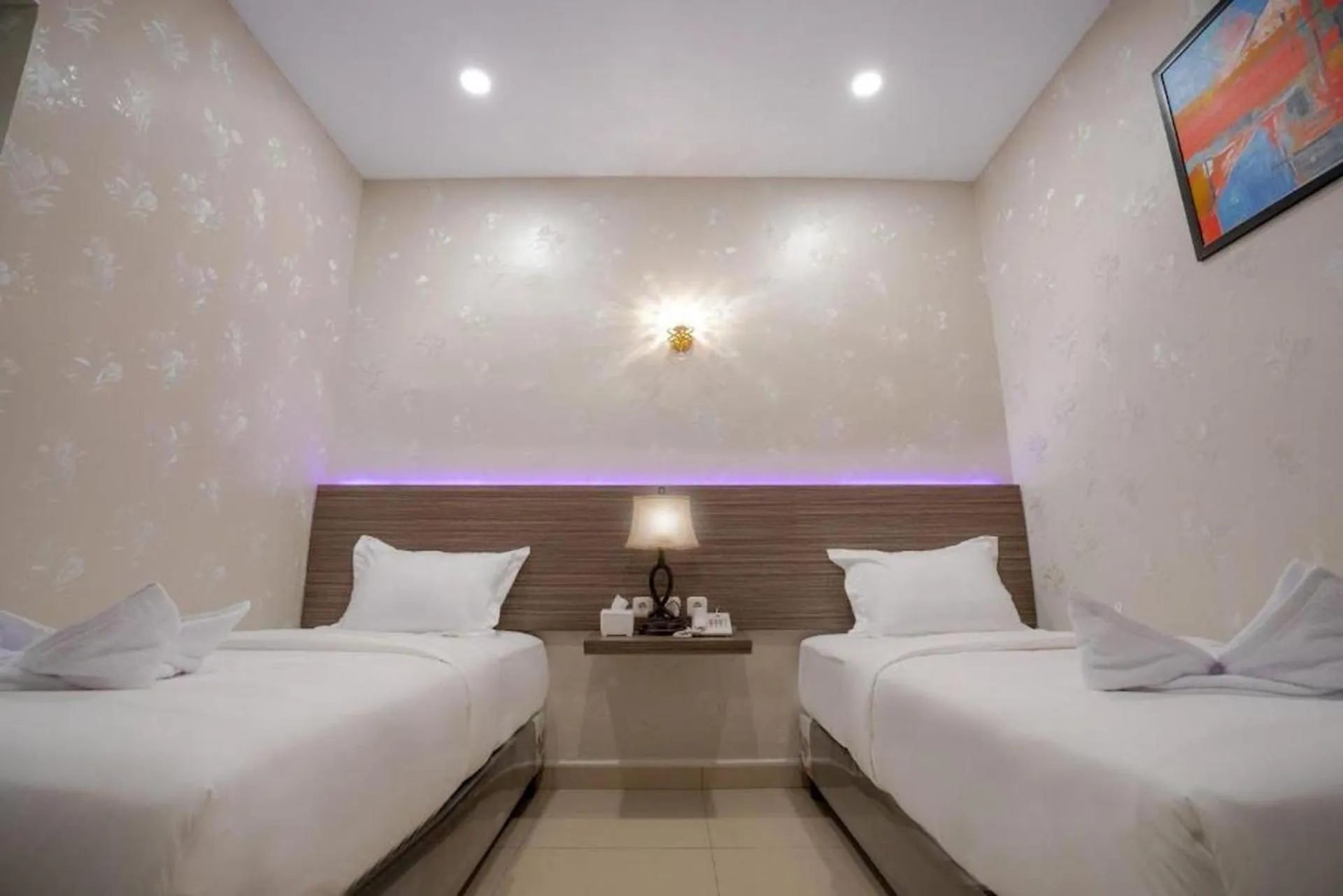 Bed in De'Tonga Hotel