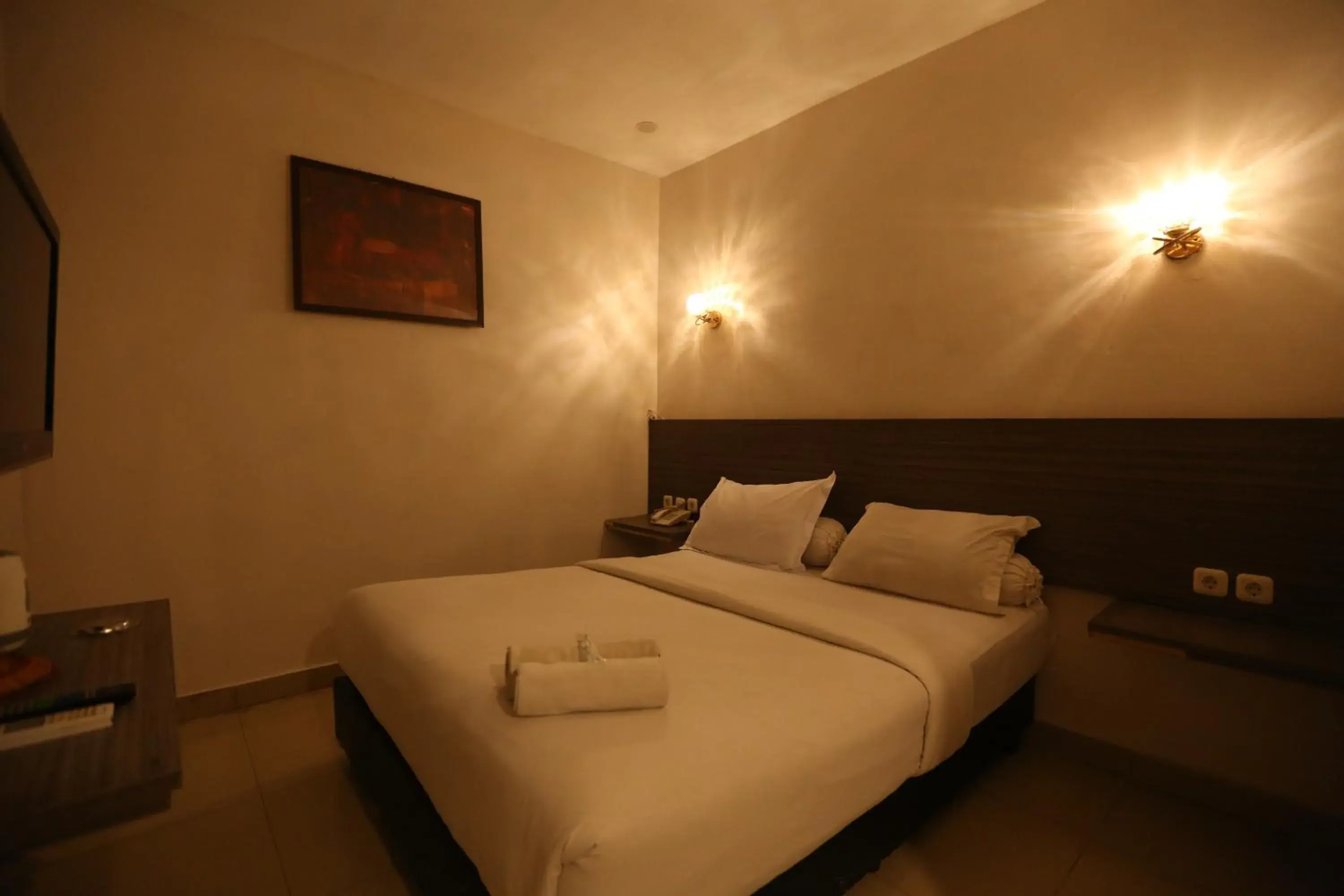 Bed in De'Tonga Hotel Bed in De'Tonga Hotel