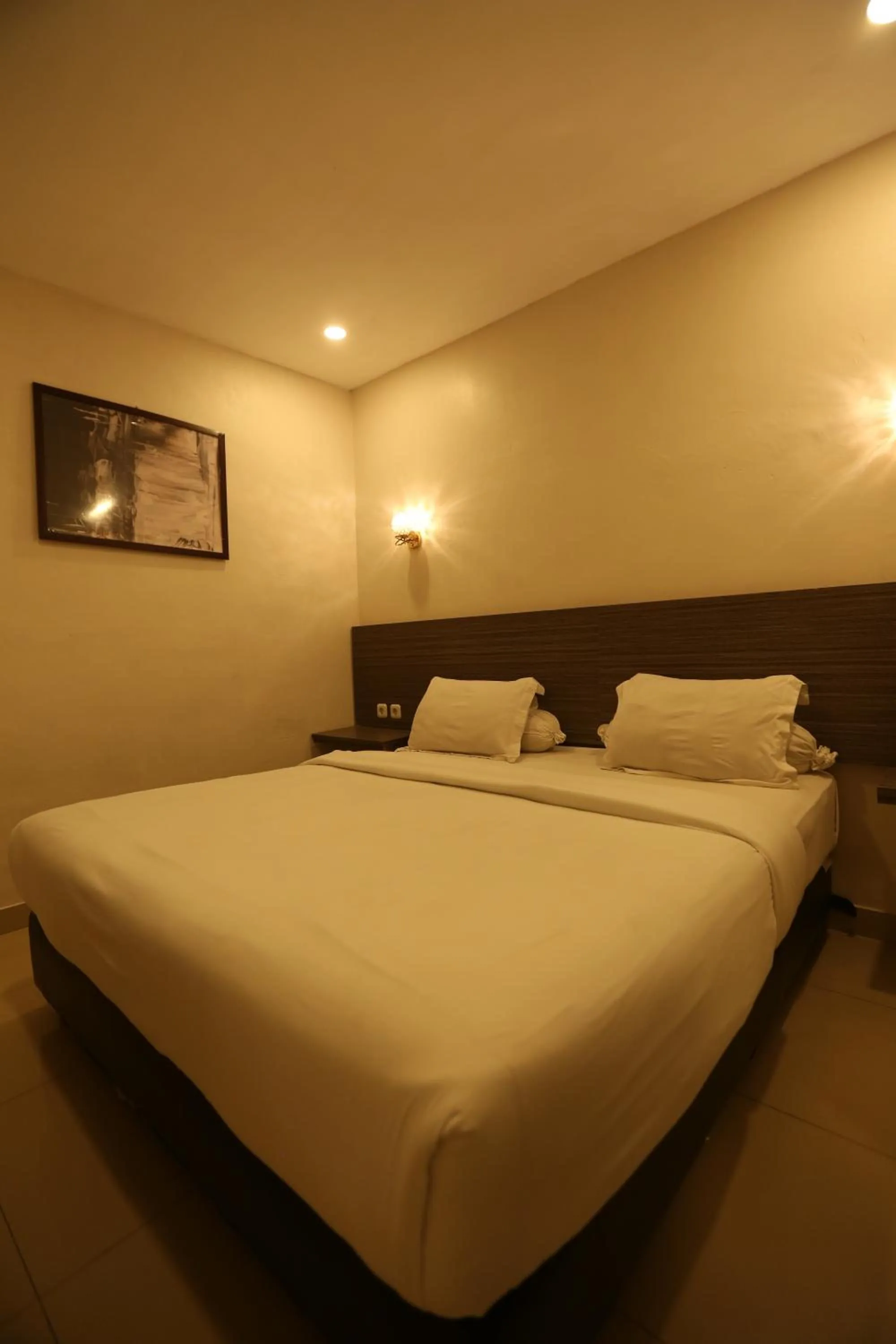 Bed in De'Tonga Hotel