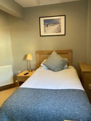 Bed in The Sleepwell Inn
