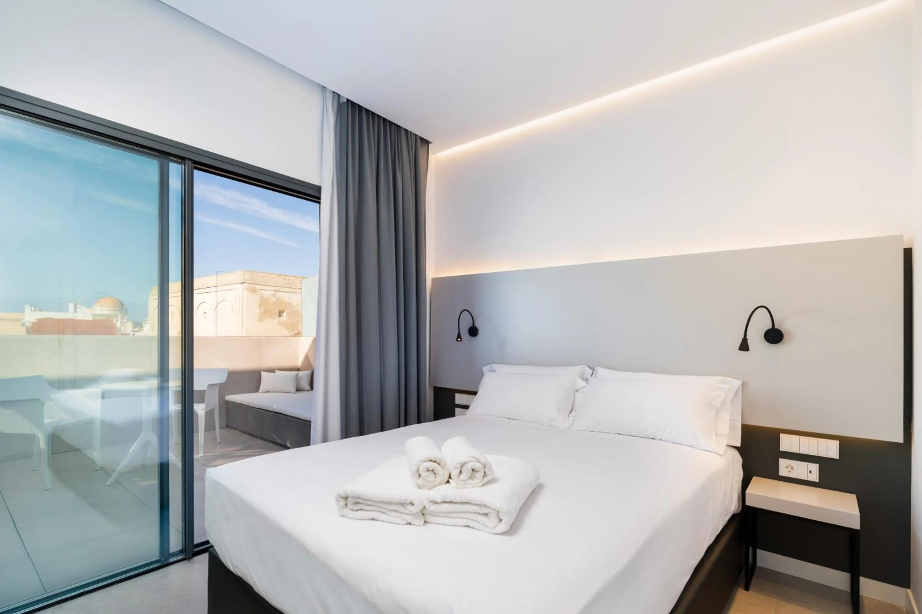 Balcony/Terrace, Bed in Dormos Hotel