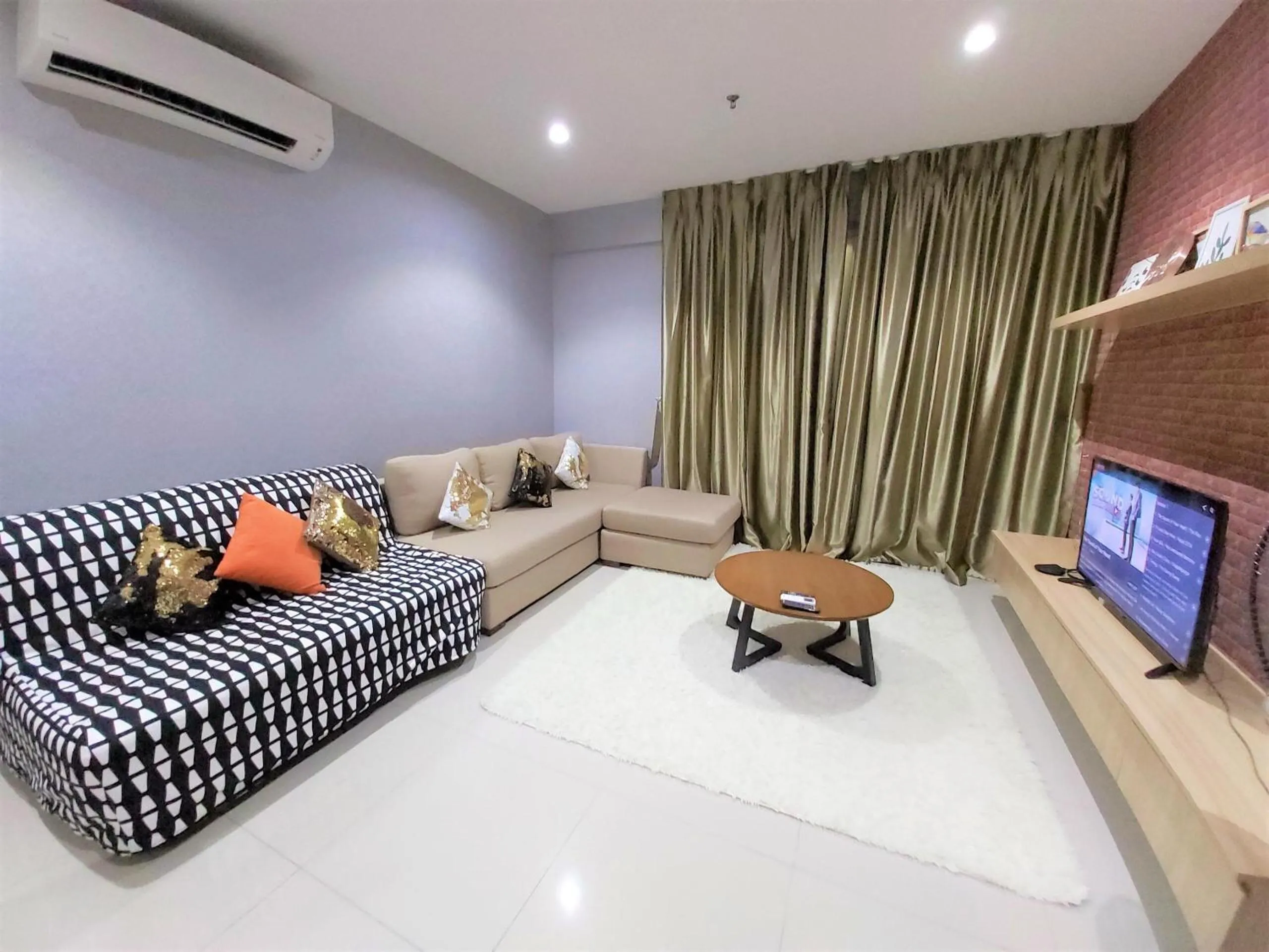 Communal lounge/ TV room in Casa Sabrina's Family Suite @ Liberty i-City, Shah Alam