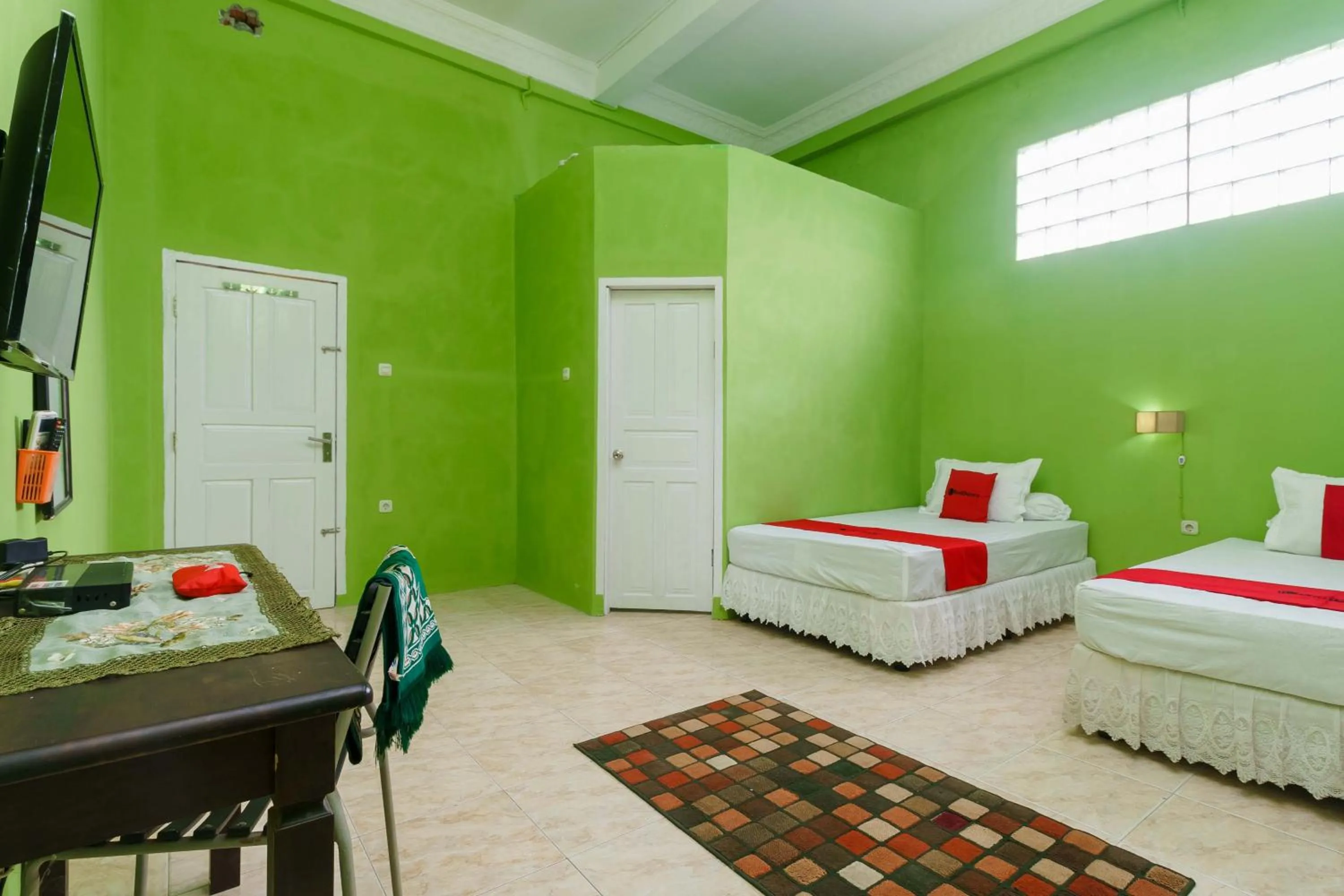 Bed in RedDoorz Syariah near Museum Tsunami Aceh 2