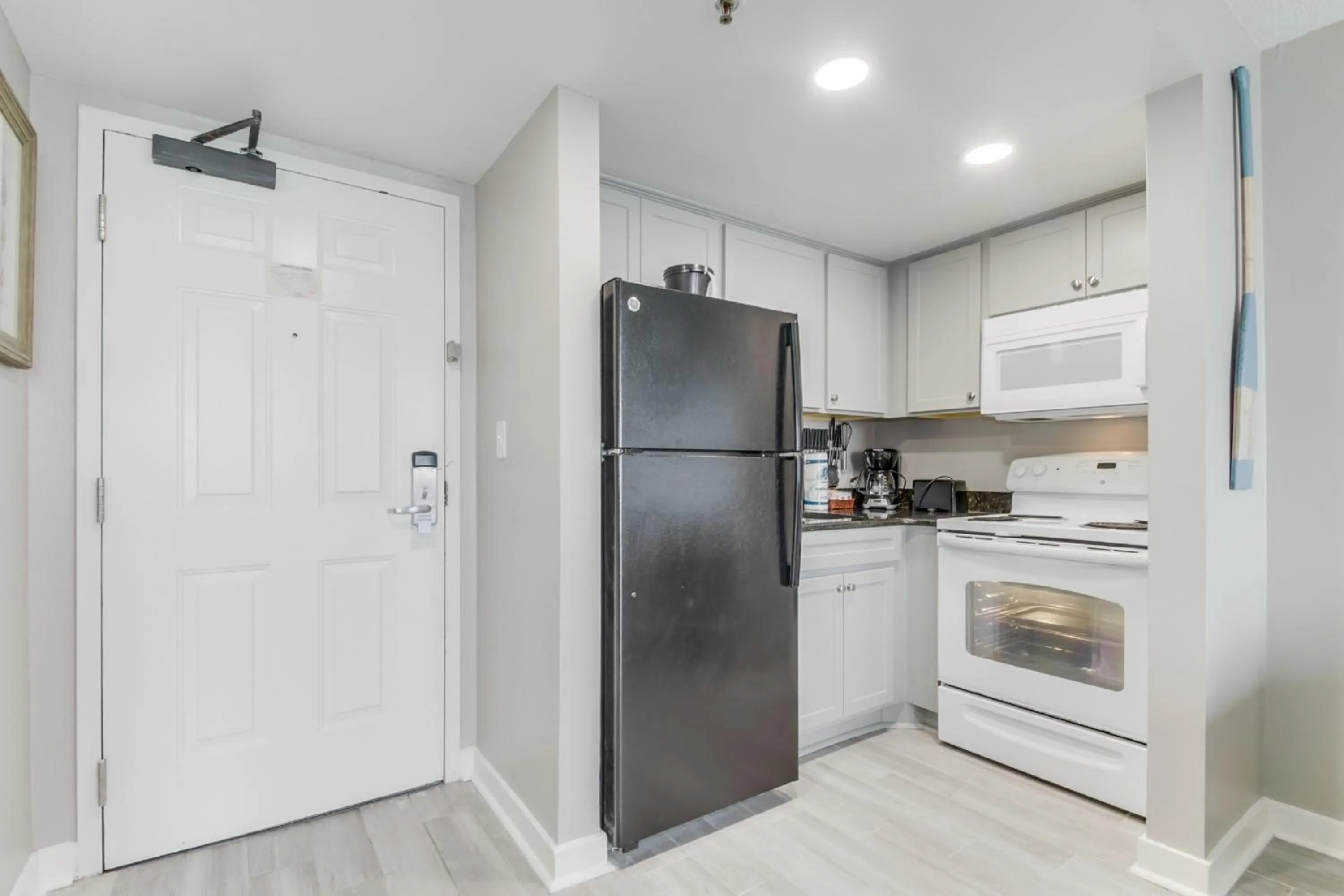 Kitchen or kitchenette in Ocean-Front Condos at Patricia Grand