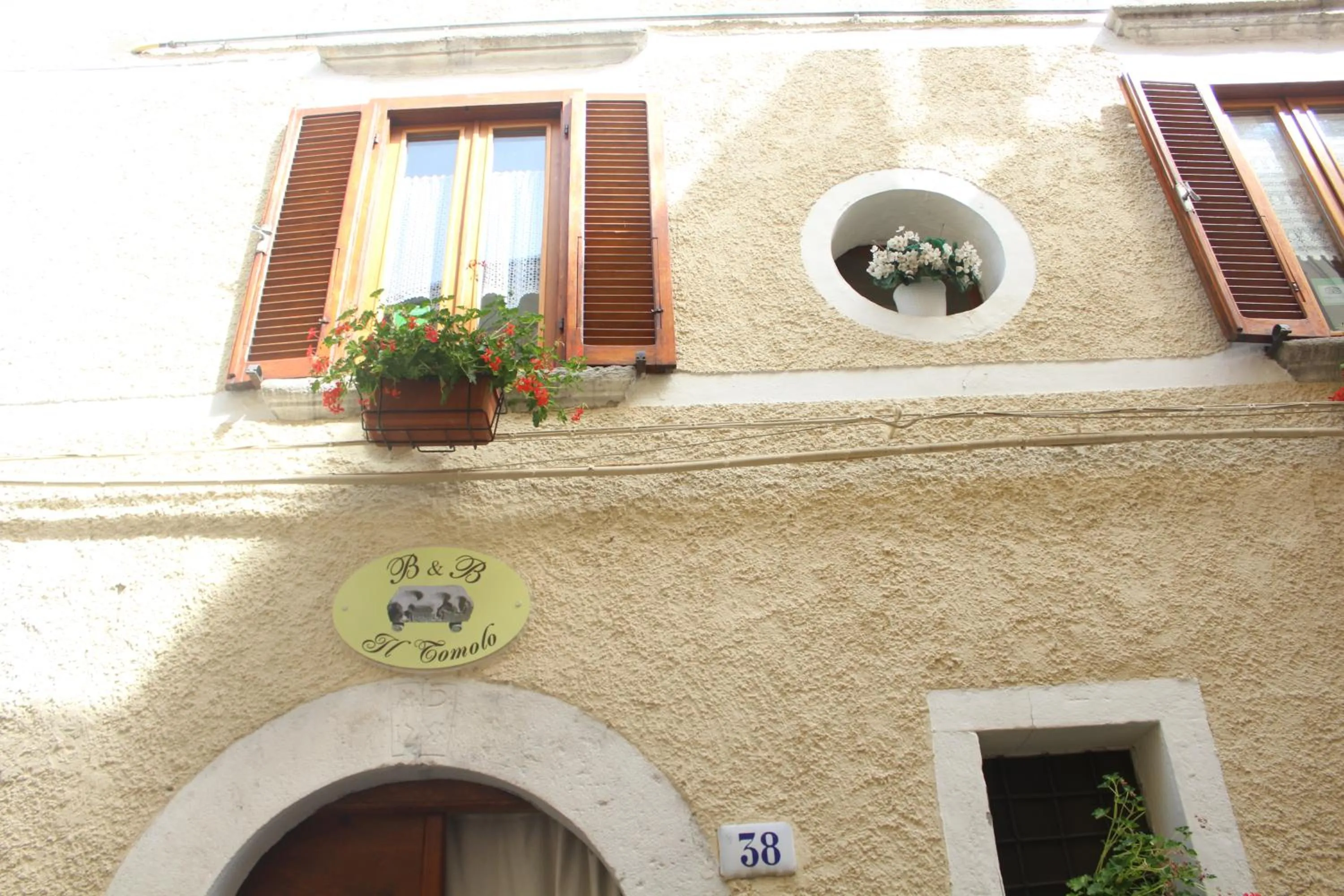 Property logo or sign in Il Tomolo