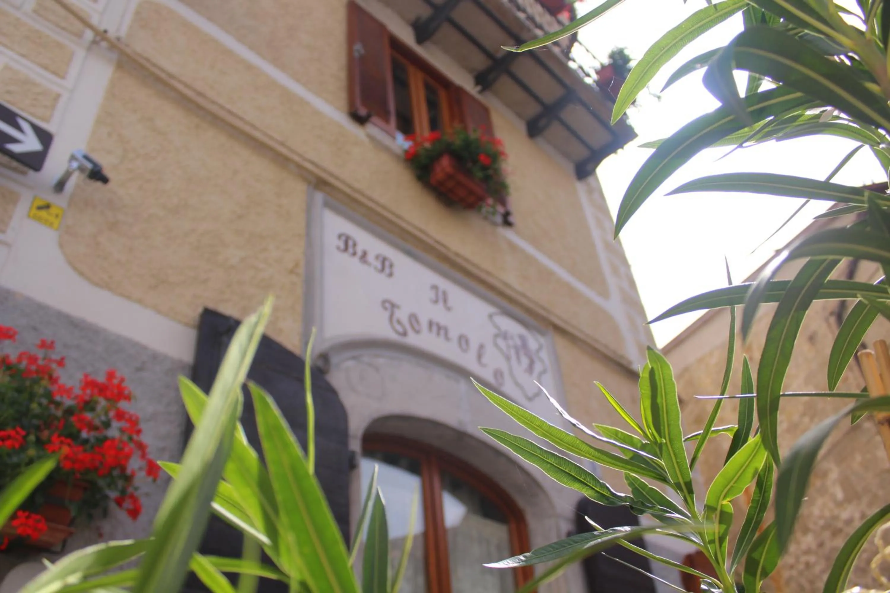 Property logo or sign in Il Tomolo