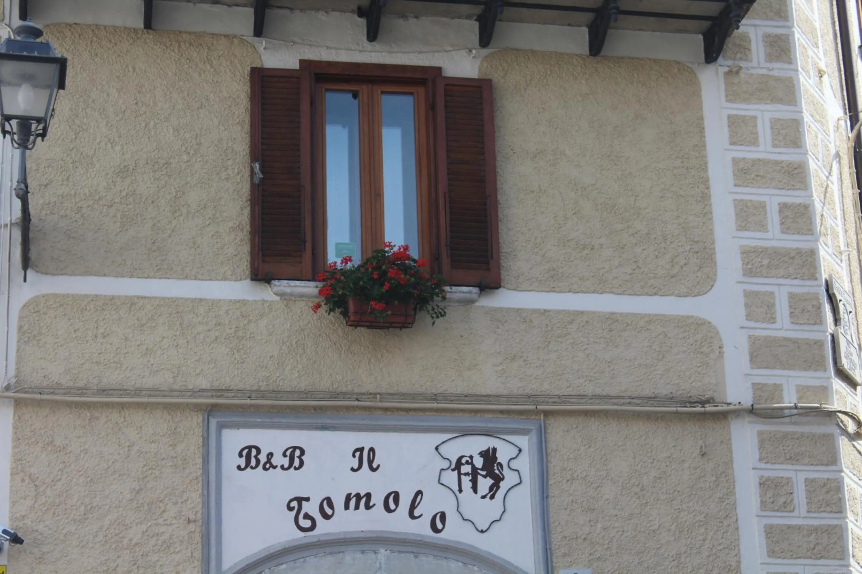 Property logo or sign in Il Tomolo