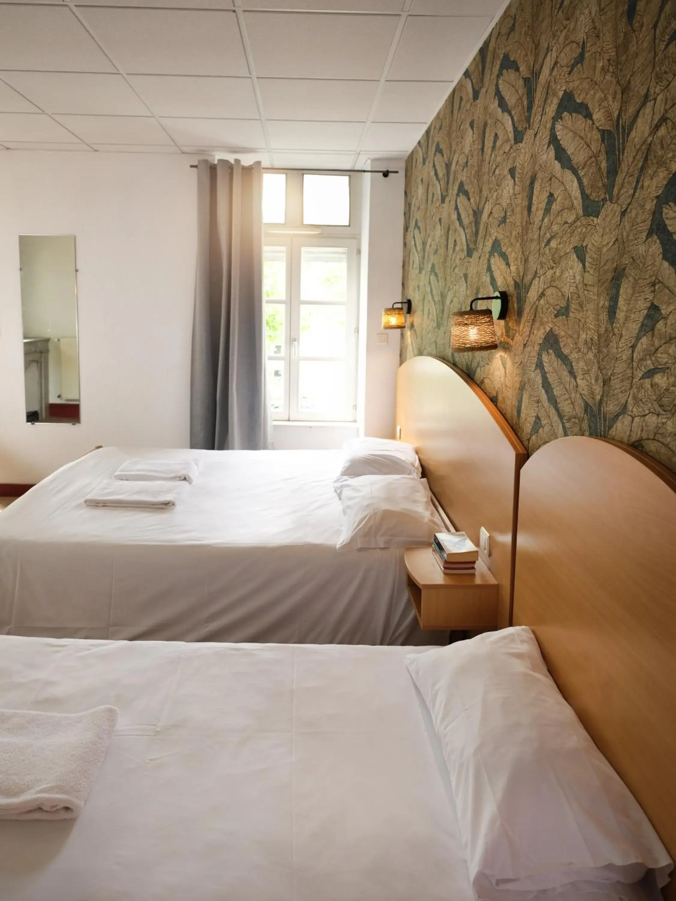 Bed in Hôtel de Lyon Bed in Hôtel de Lyon