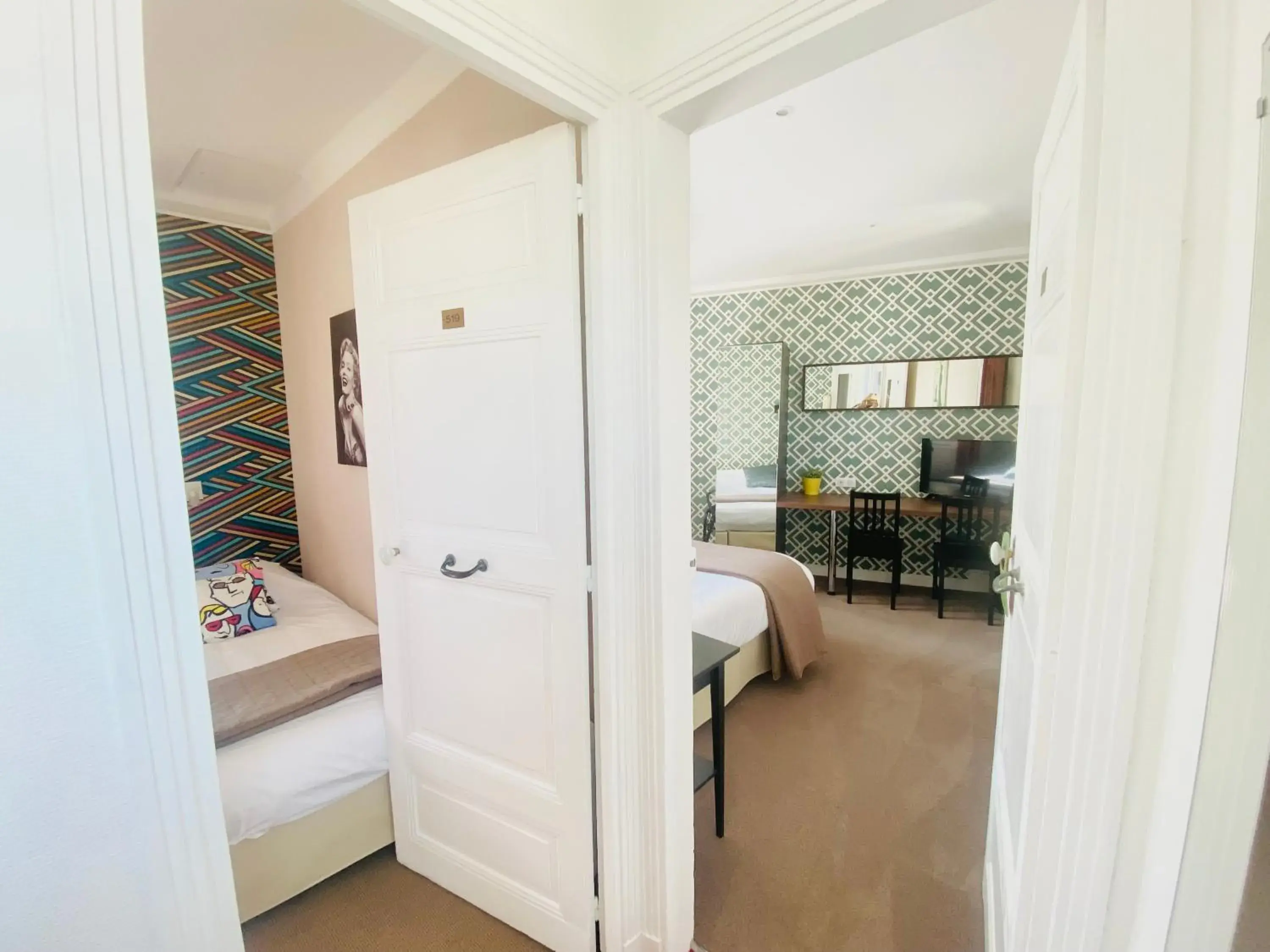 Photo of the whole room, Bed in Grand Hôtel de L'Espérance Photo of the whole room, Bed in Grand Hôtel de L'Espérance