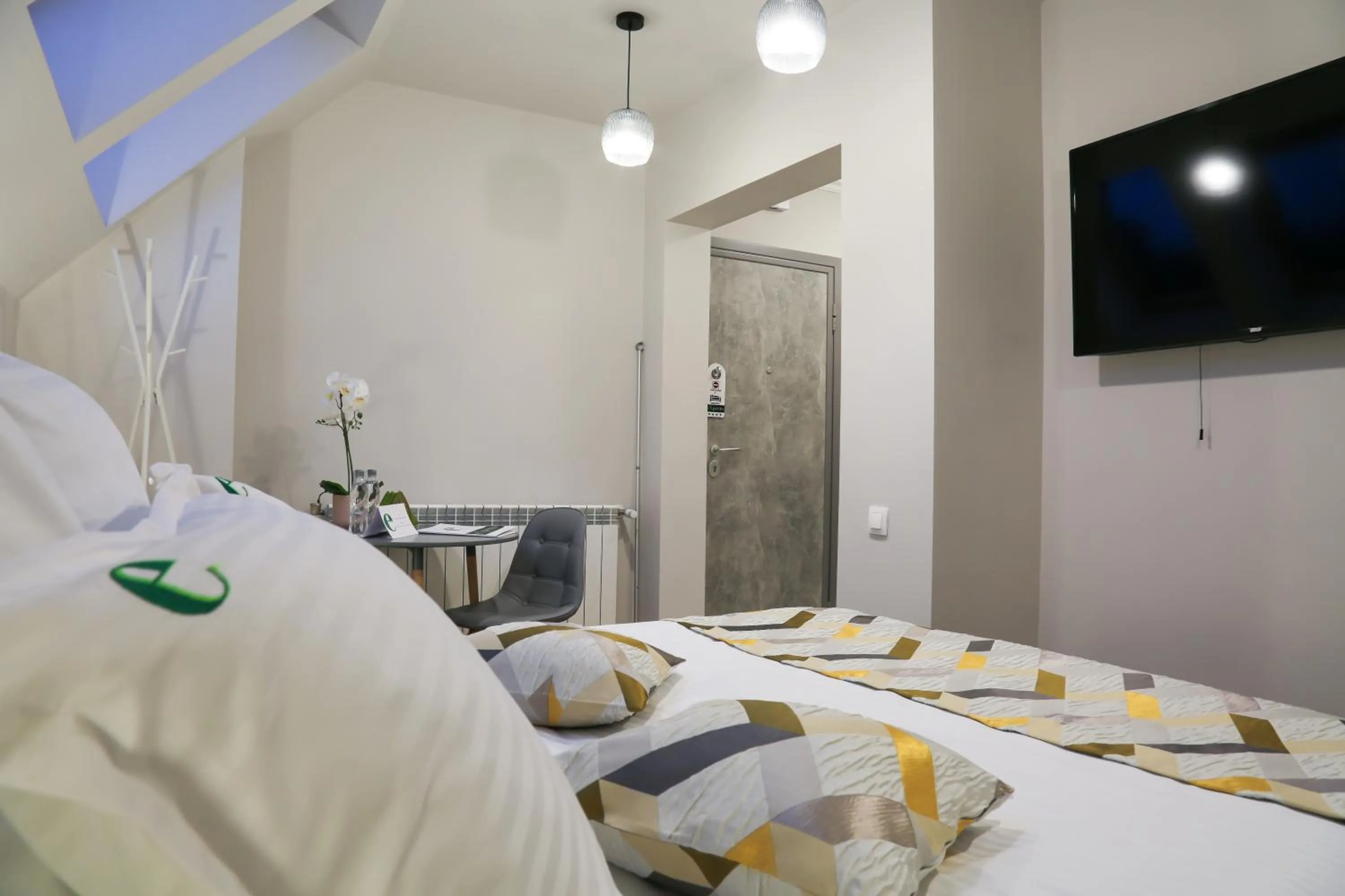 Bed in Expecto Apartments