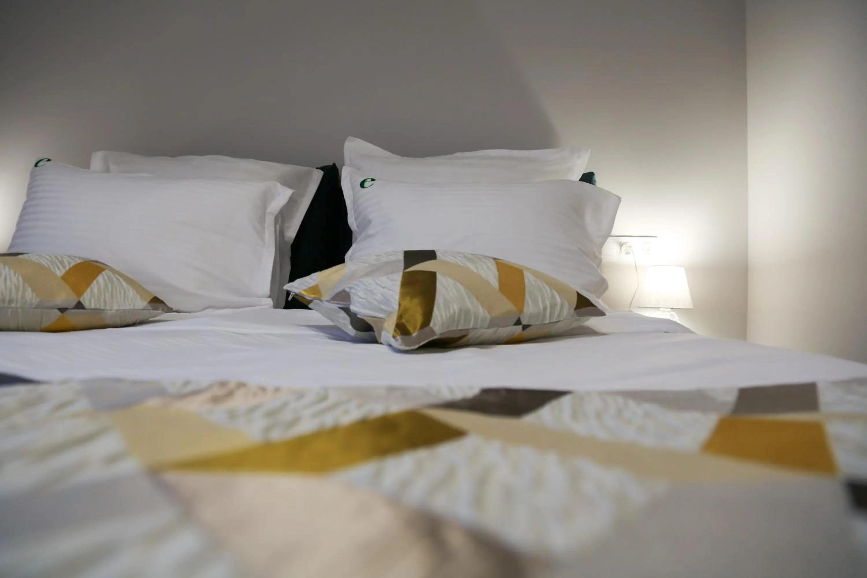 Bed in Expecto Apartments